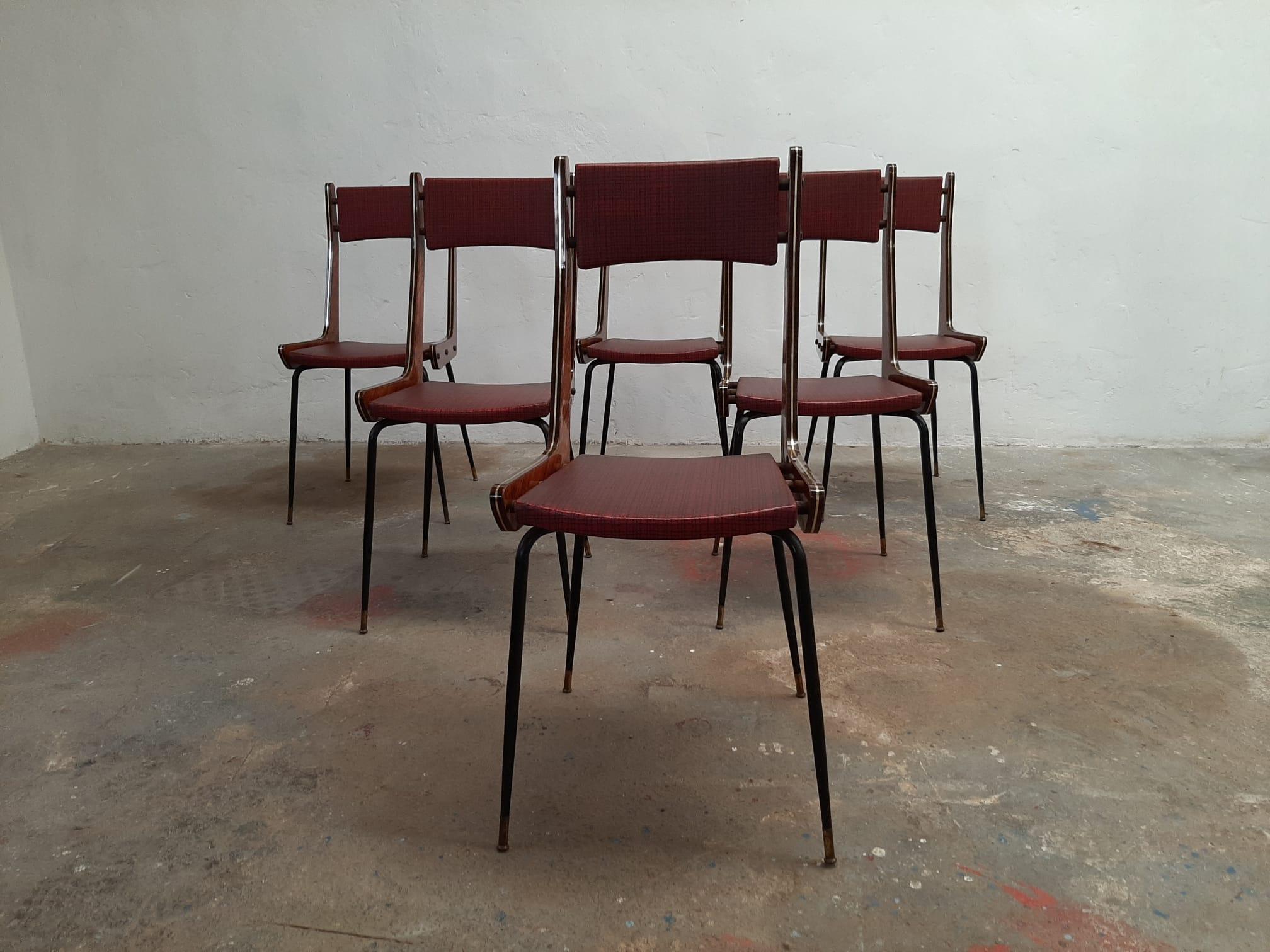 Set of 6 Italian Designer chairs from the 1950s by Carlo Ratti Boomerang model in their original condition, iron legs and finished in brass, original seat & backrest upholstery in vinyl or eco-leather, these are in perfect condition

Approx.