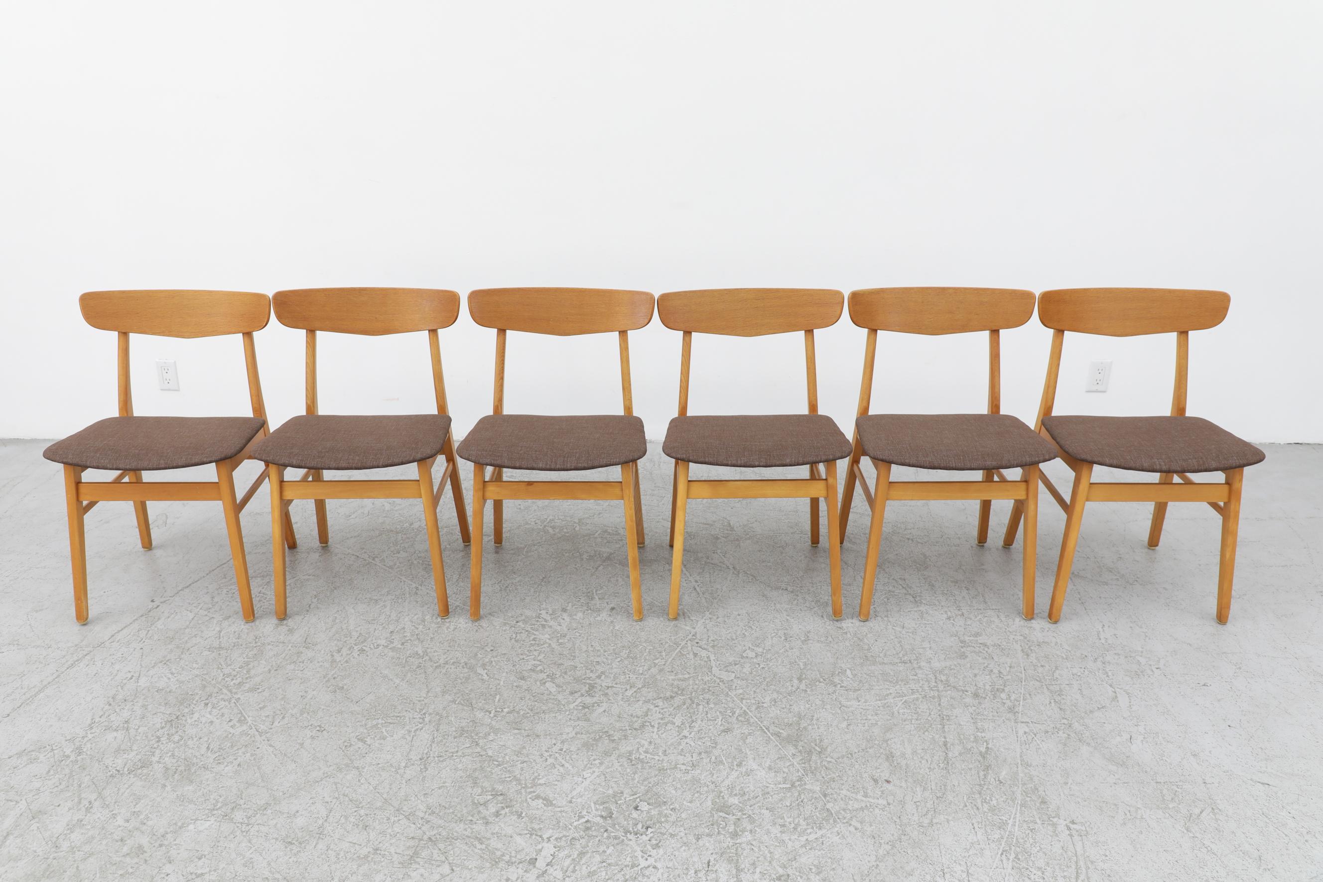 Set of 6 Borge Mogensen style dining chairs by Farstrup with a blonde wood frame and signature 60's curved teak back with seemingly floating seats. The upholstery may have been changed by previous owner. In otherwise original condition with some
