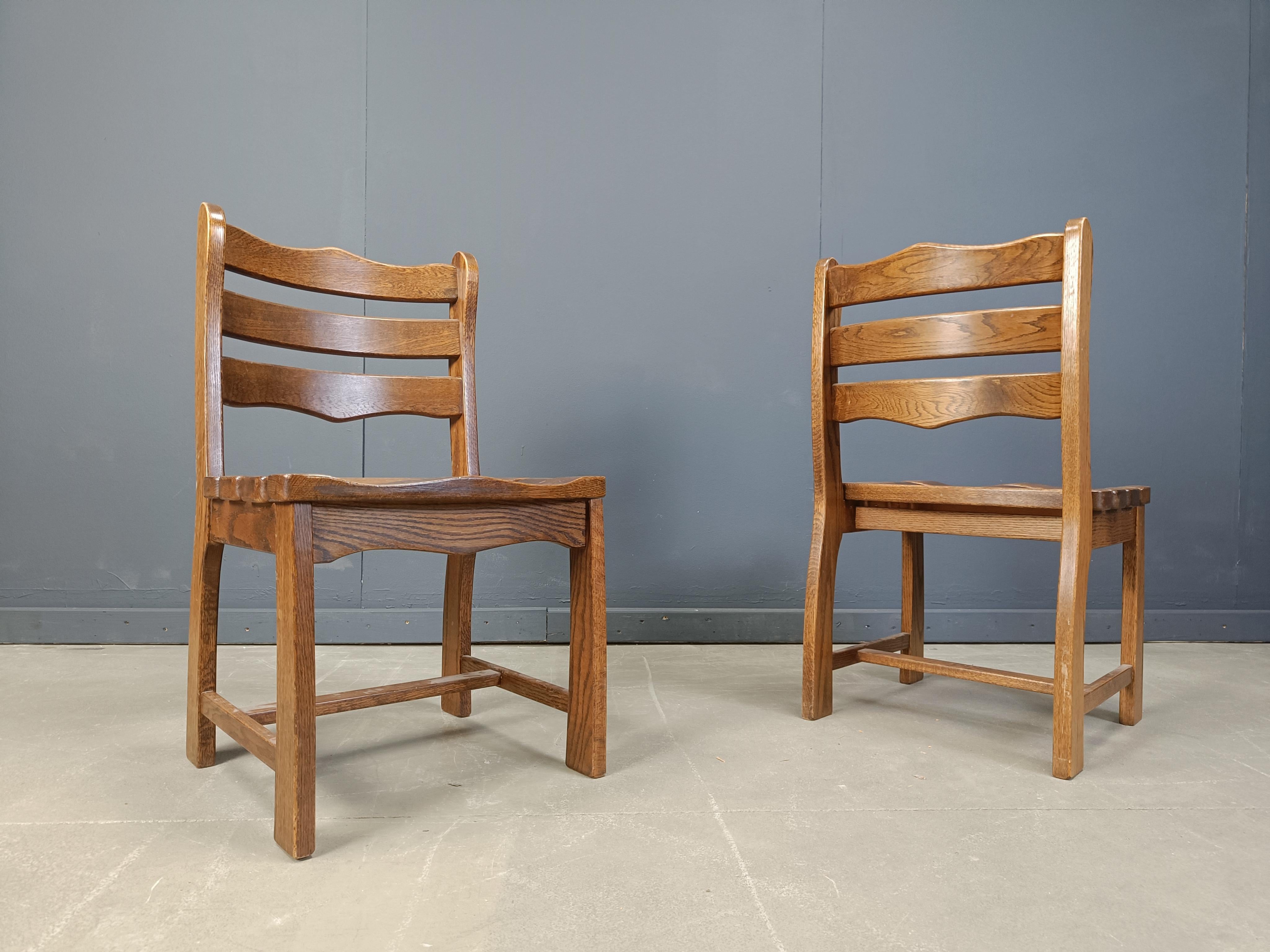Vintage brutalist solid wood dining chairs.

Cool bentwood seats.

Sturdy, rustic chairs

1960s - Belgium

Good condition

Dimensions:
Height: 90cm
Width: 50cm
Depth: 50cm
Seat height: 45cm

*Price is for the set

Ref.: 25050902

*All images are