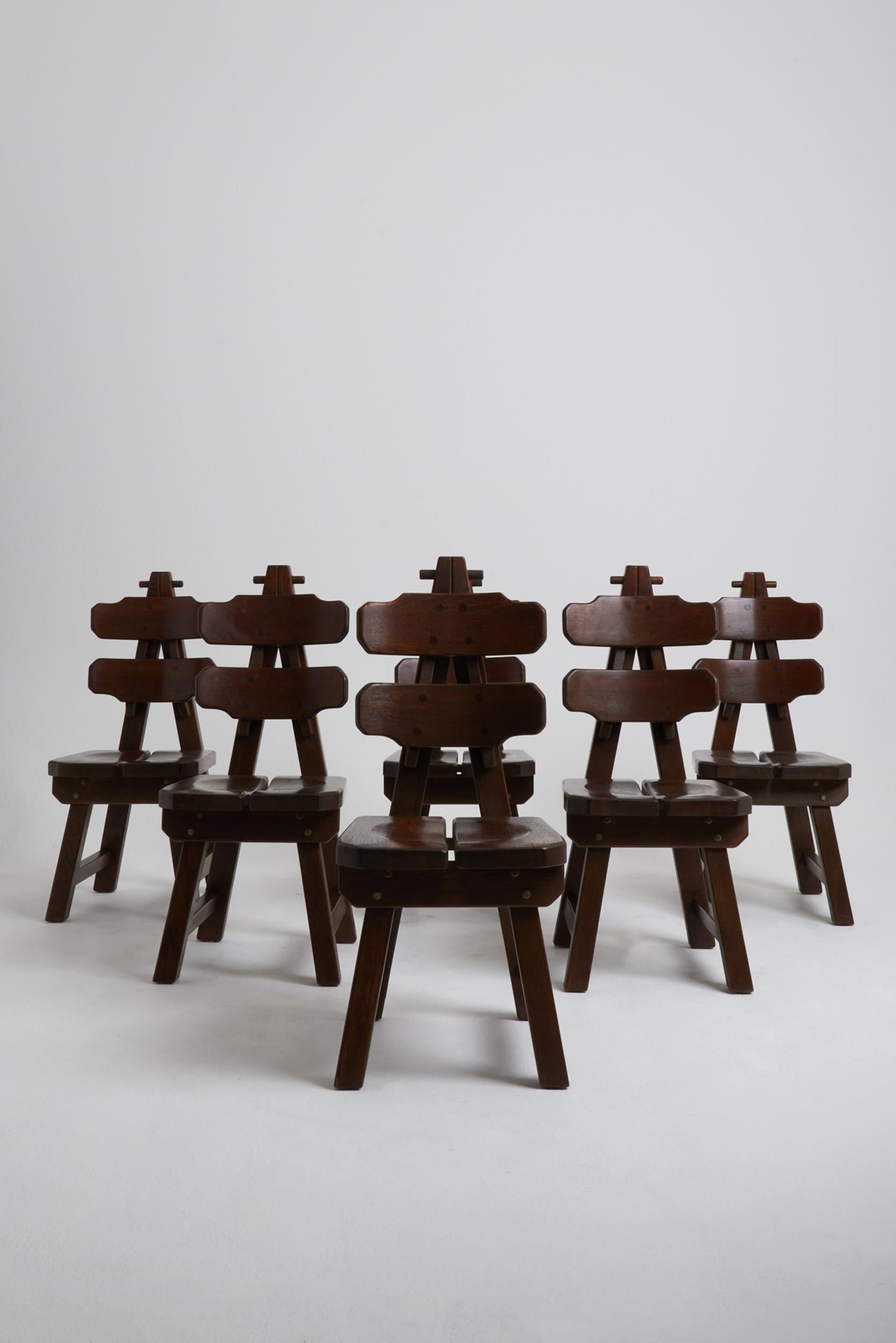 A set of six Brutalist solid oak dining chairs. Beautifully constructed.
France, third quarter of the 20th century.