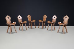 Set of 6 Brutalist Saddle Chairs in Stained Beech with Patina, France, 1950s