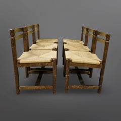 Set of 6 brutalist wood and papercord dining chairs, Netherlands 1960s