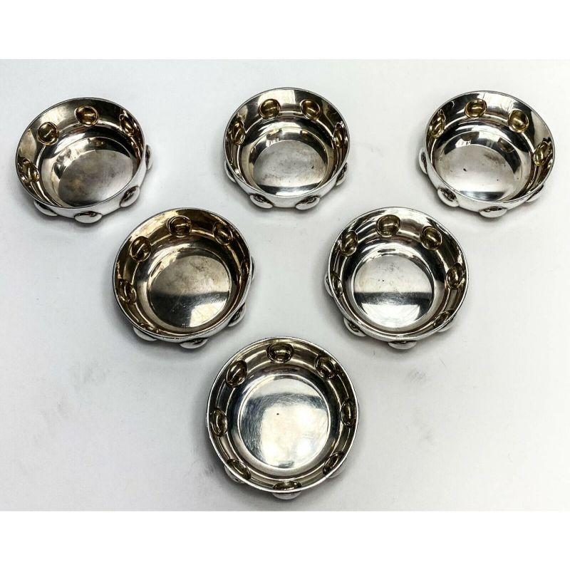 Set of 6 Bvlgari .950 Sterling Silver Modernist Tastevin, 1969 & 1978

6 Bvlgari silver tastevins with delightful modern spin on the tradition tastevin with a series of raised lobes for grips as opposed to a handle. 3 dated 1969, 3 dated 1978. All