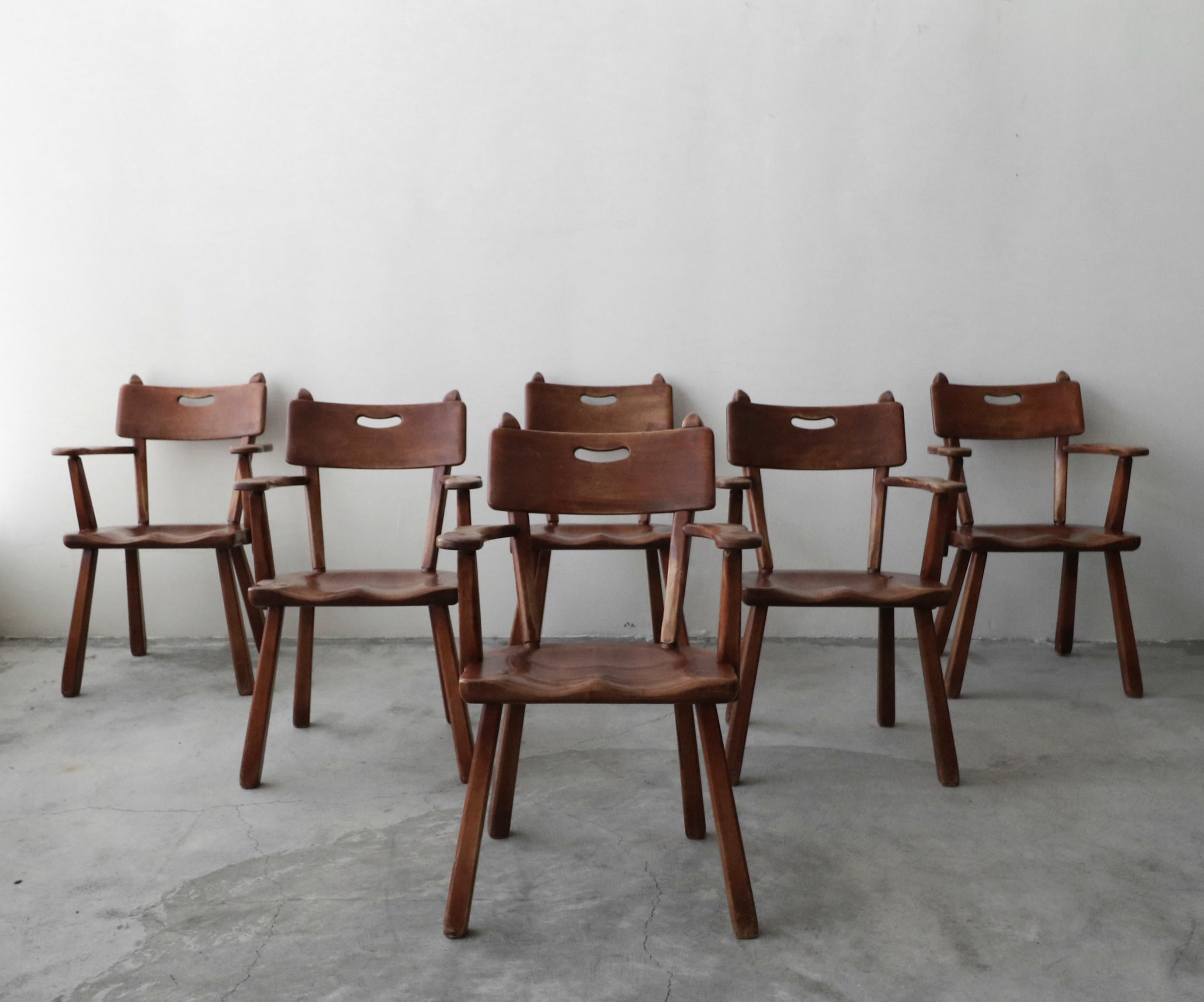 One of a kind set of handcrafted, midcentury Studio Craft chairs designed in 1956 by Herman de Vries for Cushman, tagged.

Constructed of solid maple wood and joined with dowels. Seamless construction, with beautiful lines, a truly unique set.