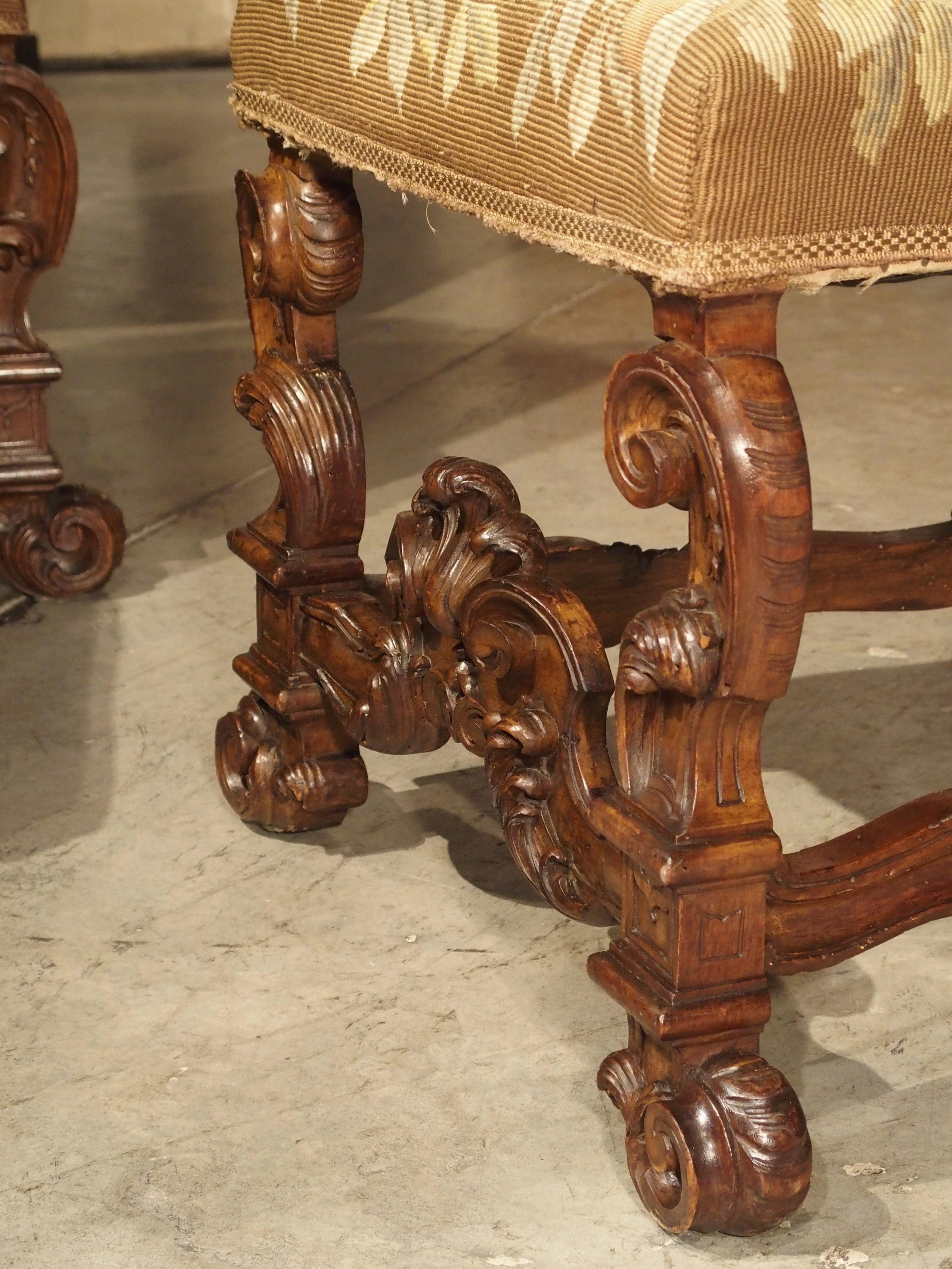 This group of 6 side chairs were carved from walnut wood in the latter half of the 1800s. They are from the Italian region of Lombardy, which has long been a global center for banking and fashion. The design of the chairs is in the style of the late