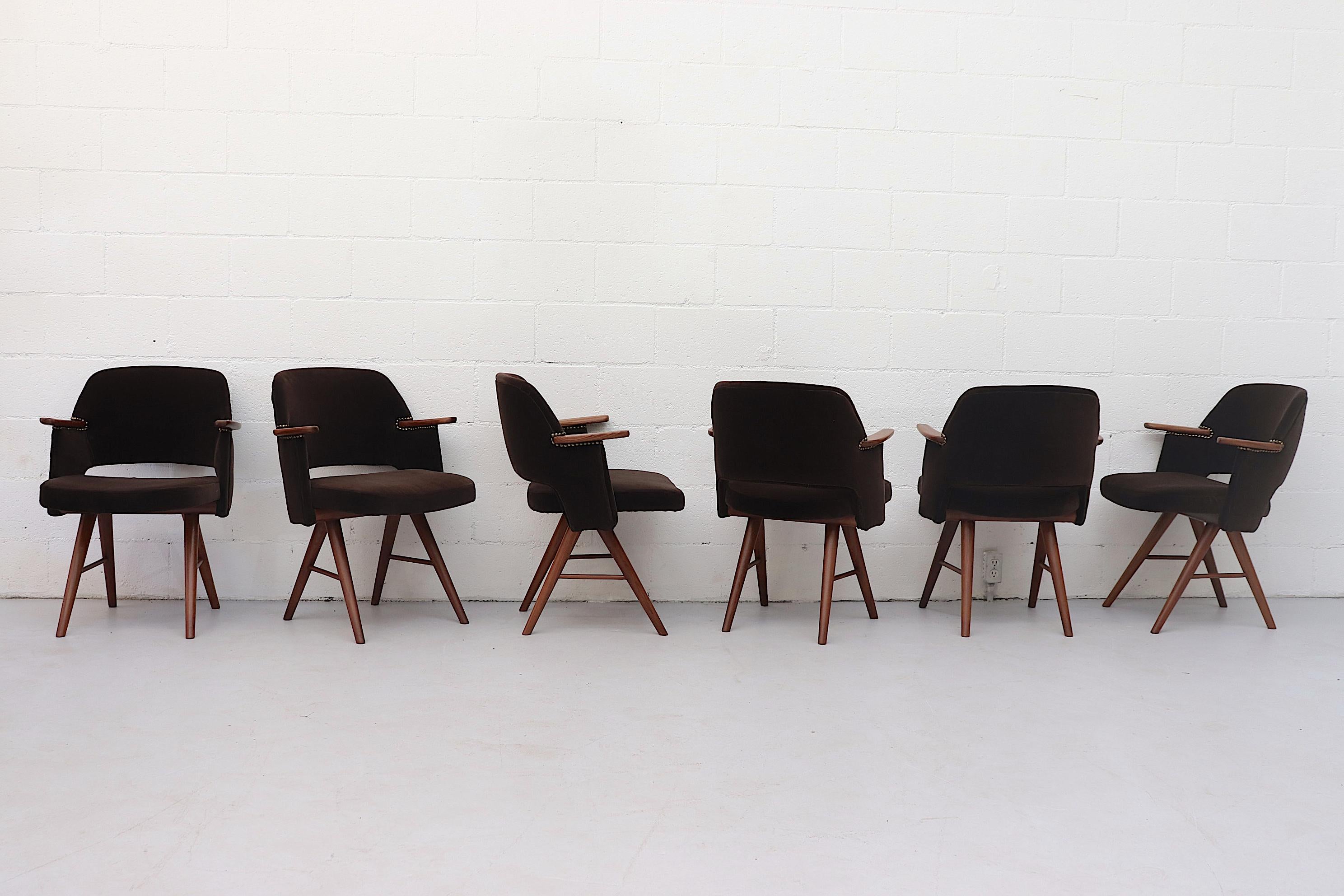 Gorgeous set of 6 mahogany velvet FT30 dining chairs with brass stud accents by Cees Braakman for Pastoe. Newly re-upholstery seating with lightly refinished teak arm rests and tapered teak legs. Good original condition with wear consistent with age