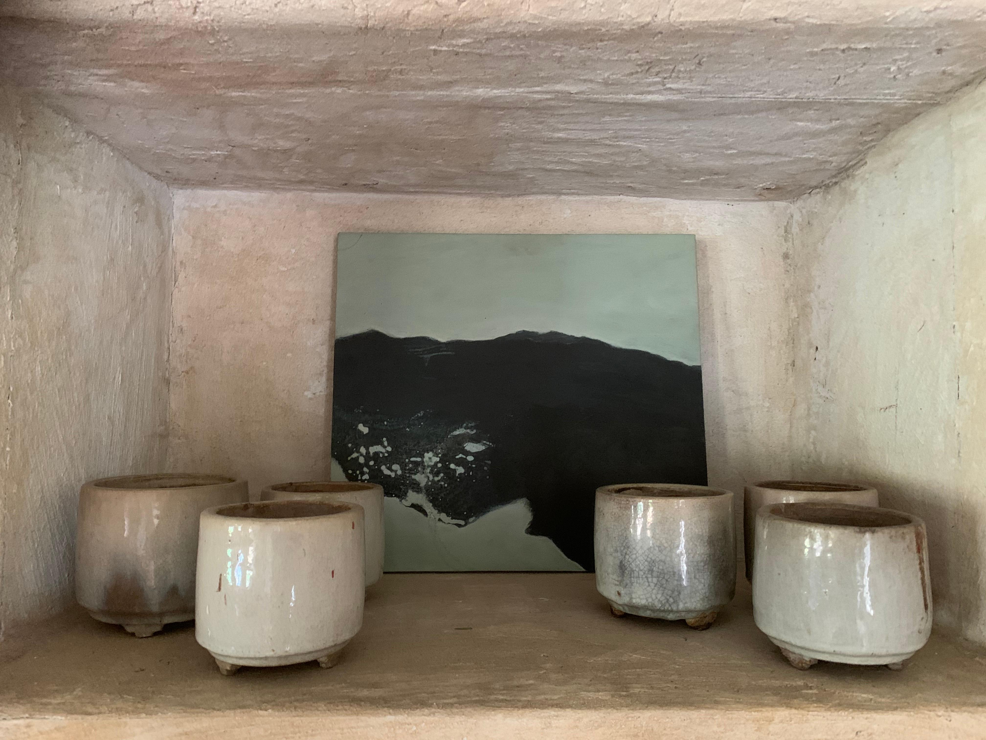 A set of 6 19th century Celadon Incense burner pots. These small pots were used in shrines and tempels to burn incense sticks. Filled up with sand the sticks could be pushed in. Not one is the same but all have beautiful celadon shades with great
