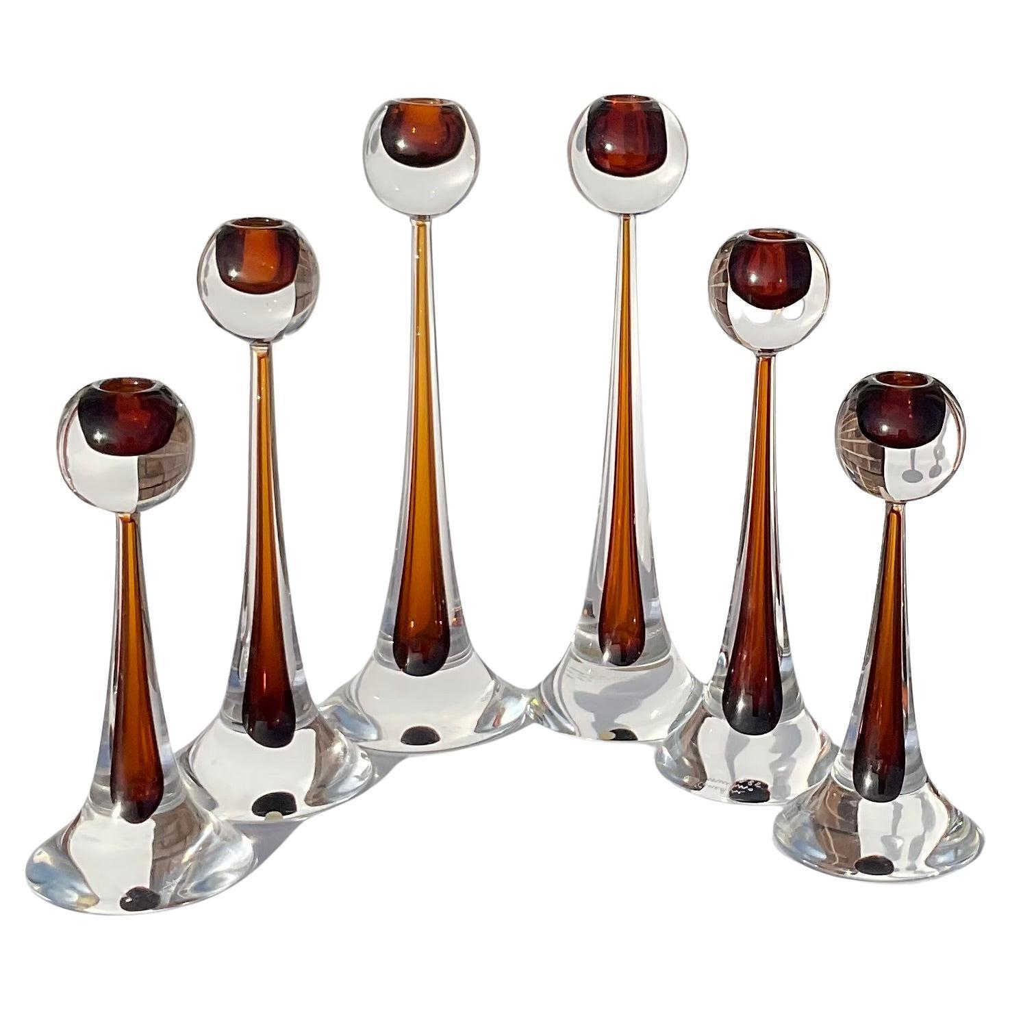 Set of 6 Cenedese Murano Sommerso Glass candlestick sculptures designed by Antonio DaRos. Signed and dated 1985. Each is signed and dated to base; Two smallest 10 in. height, Two medium 12 in. Height, Largest Two: 14 1/4 in. Height. These