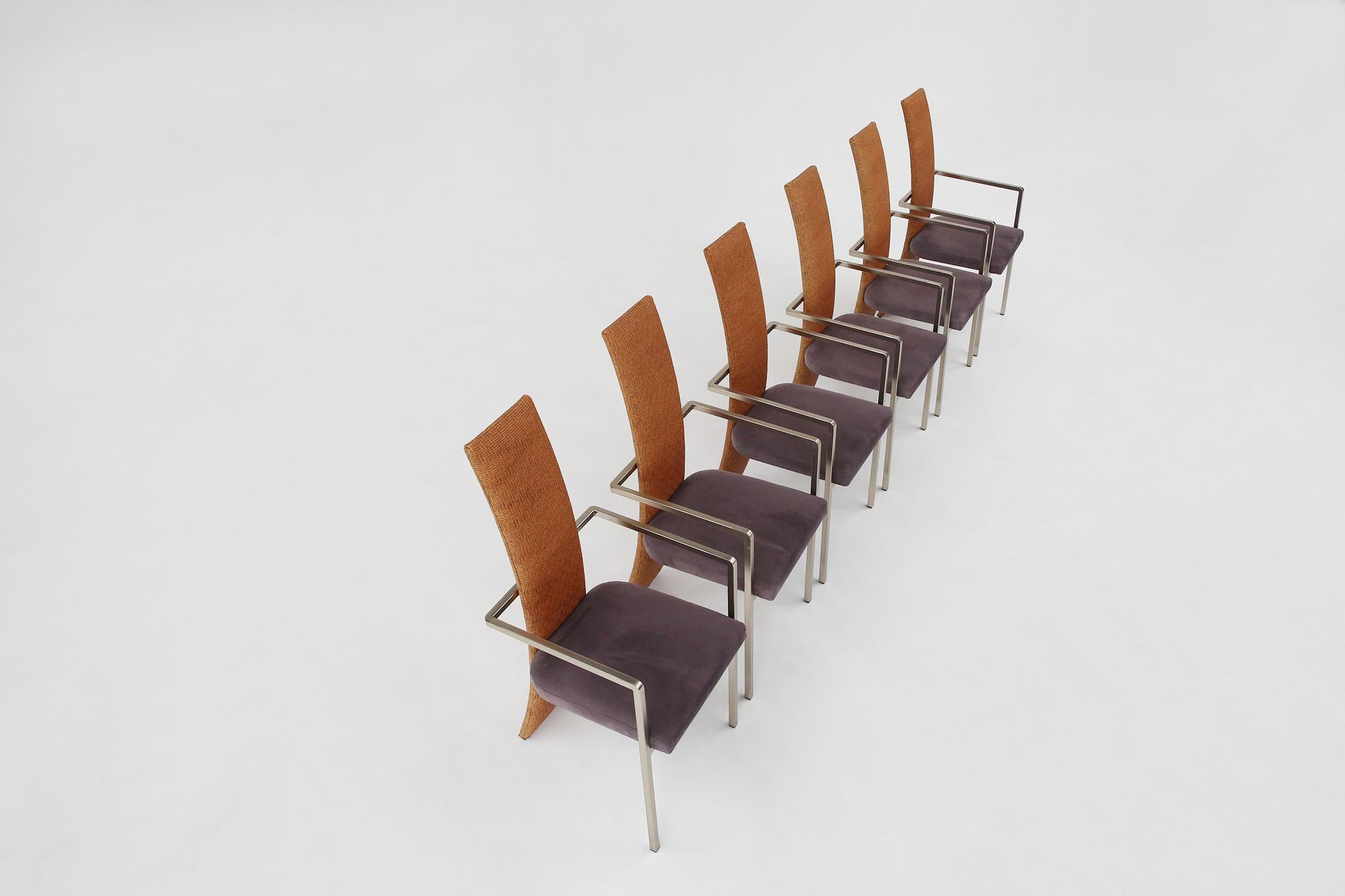 Set of 6 chairs made by Belgian brand Belgo Chrom in 1970s.
Made of stainless steel, purple fabric seat and cane backrest. In the style of Maison Jansen. Matching dining table is also available.