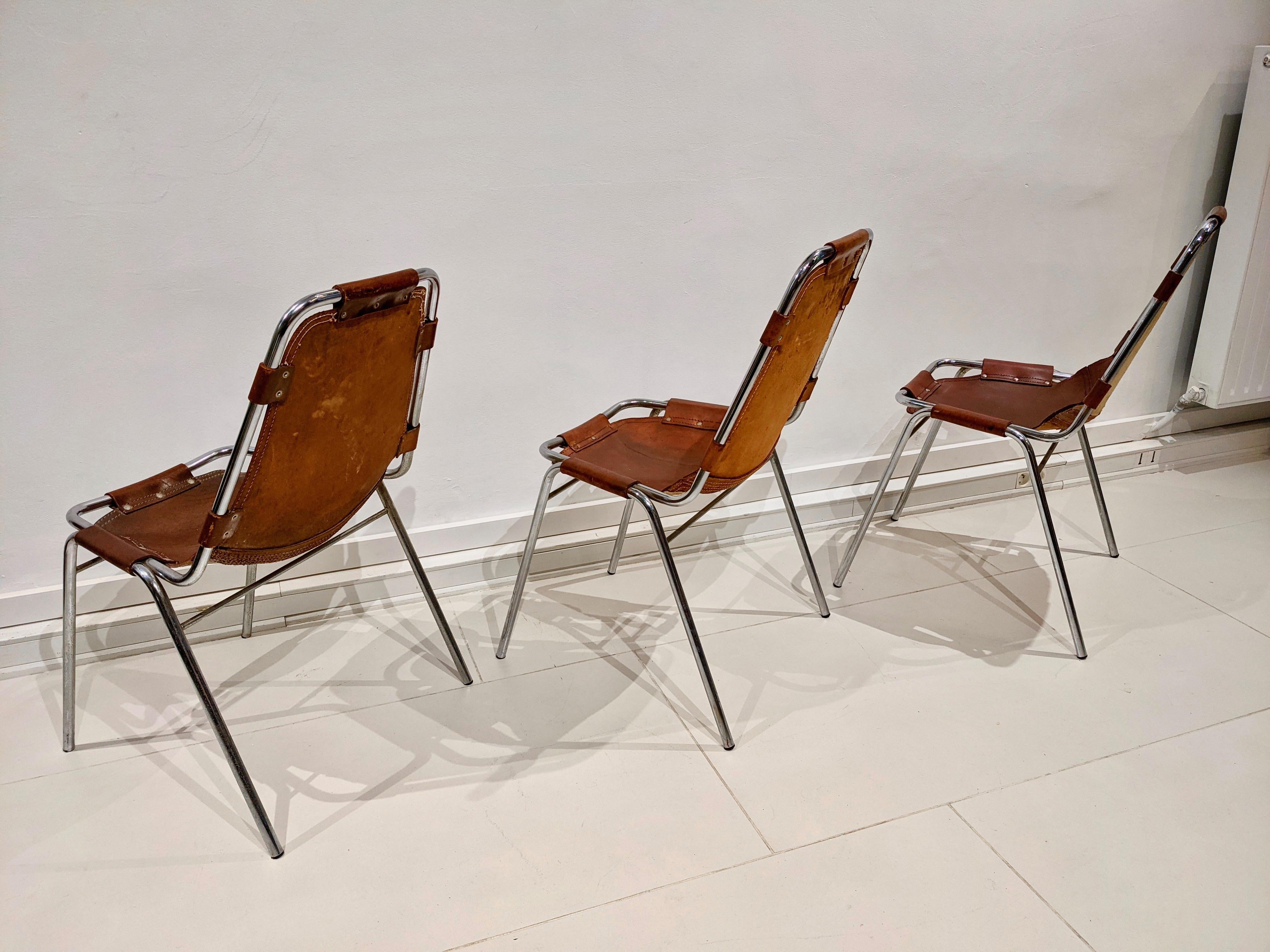 Mid-Century Modern Set of 6 Chairs by Charlotte Perriand for Les Arcs in Cowhide