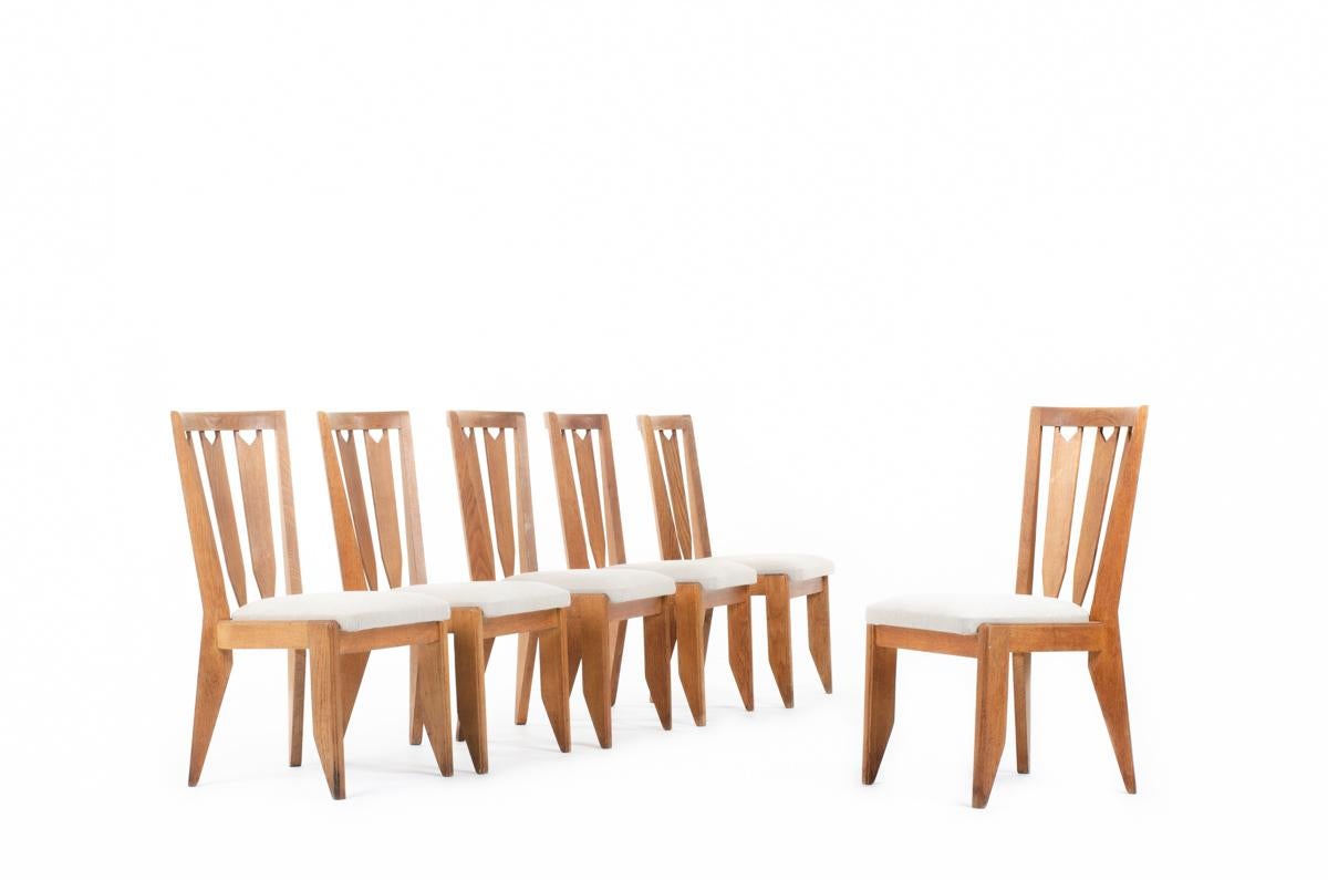 Set of 6 chairs by designers Robert Guillerme and Jacques Chambron in the 1950s
Structure in patinated oak, seat covered by beige linen
Very nice patina of time.