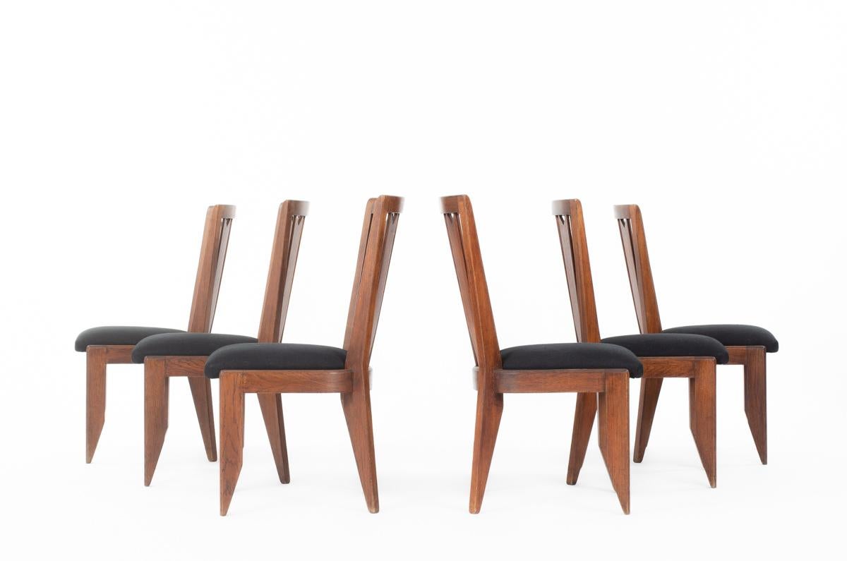 Set of 6 chairs by designers Robert Guillerme and Jacques Chambron in the 1950s.
Structure in patinated oak, seat covered by black linen.
Very nice patina of time.
