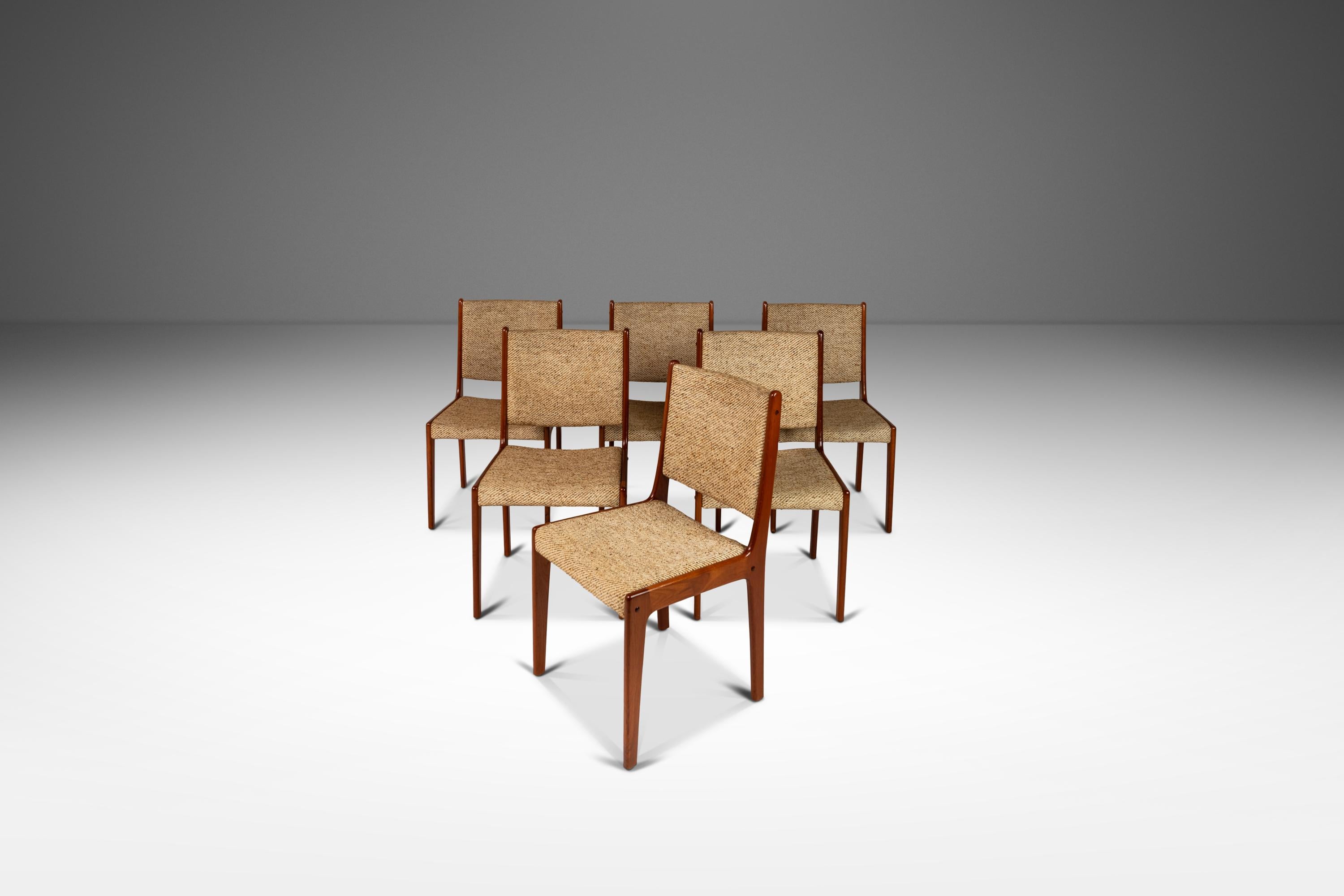  Introduce a touch of Danish elegance to your dining area with this exquisite set of six high-back dining chairs, designed by Johannes Andersen for Farso Stolefabrik and crafted in Denmark circa 1970s. Constructed from luxurious teak wood, these