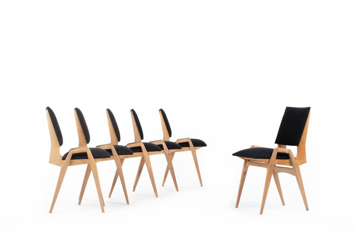 Set of 6 chairs by Maurice Pre in the 1950s in France.
Minimalist structure in beech with seat and back covered with black linen.