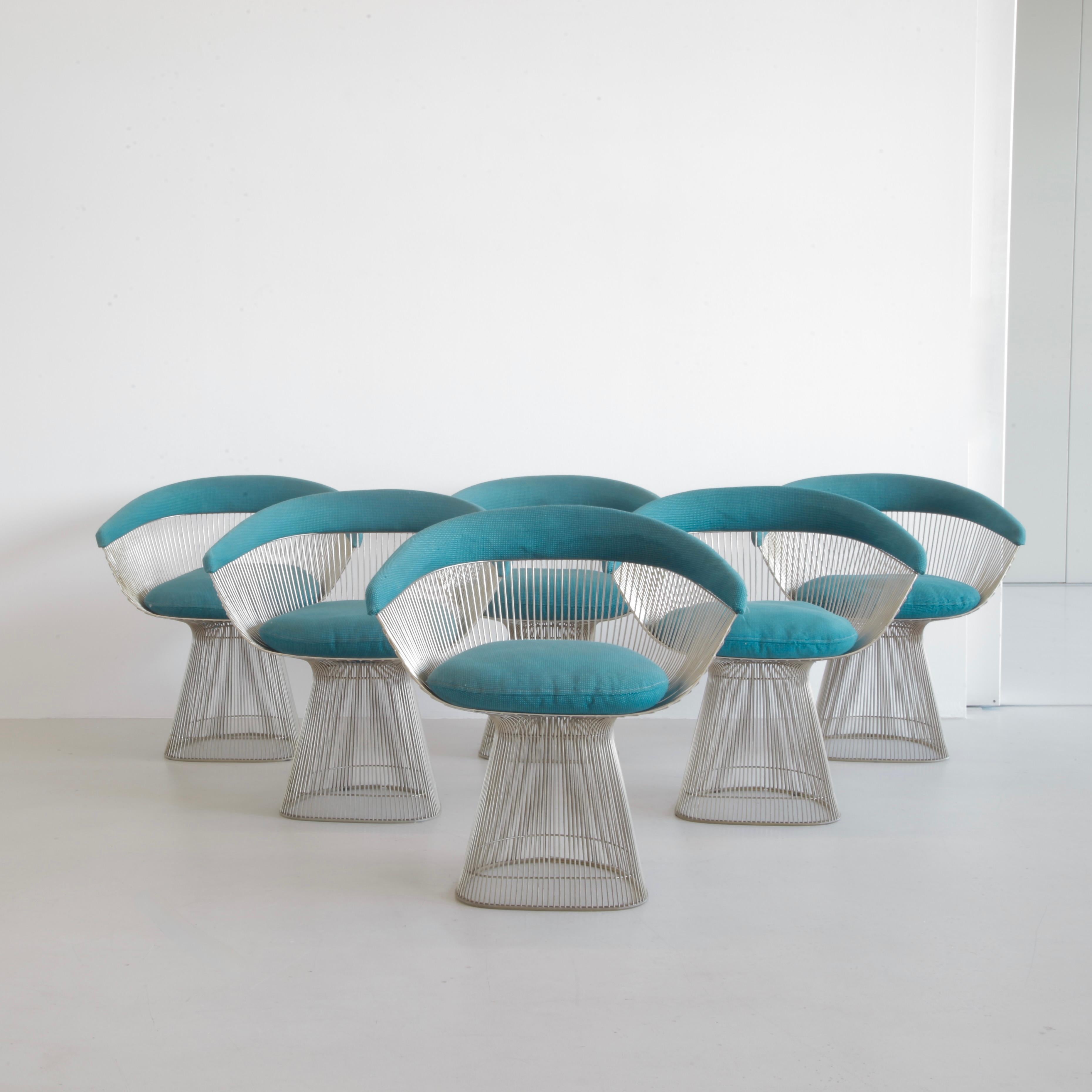 Set of 6 armchairs designed by Warren Platner. U.S.A., Knoll International, 1966.

Wonderful vintage set of six chairs in polished nickel with turquoise backs and seat cushions. An unrestored set dating from the 1970s with good