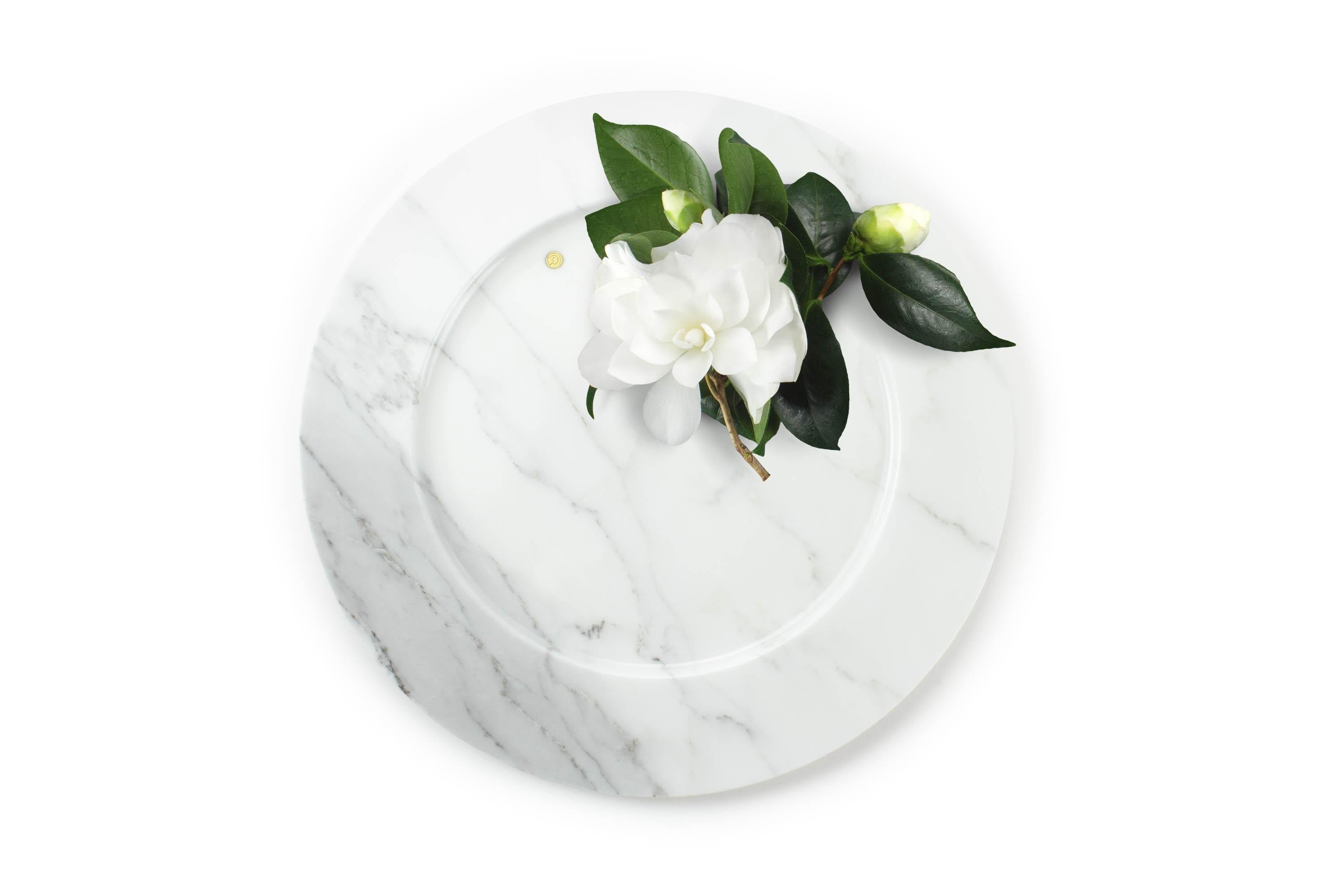 Set of 6 hand carved charger plates from Statuary marble 'Altissimo'. 
Multiple use as charger plates, plates, platters and placers. 
The precious white statuary marble has always been the one preferred by sculptors and artists for their artworks.