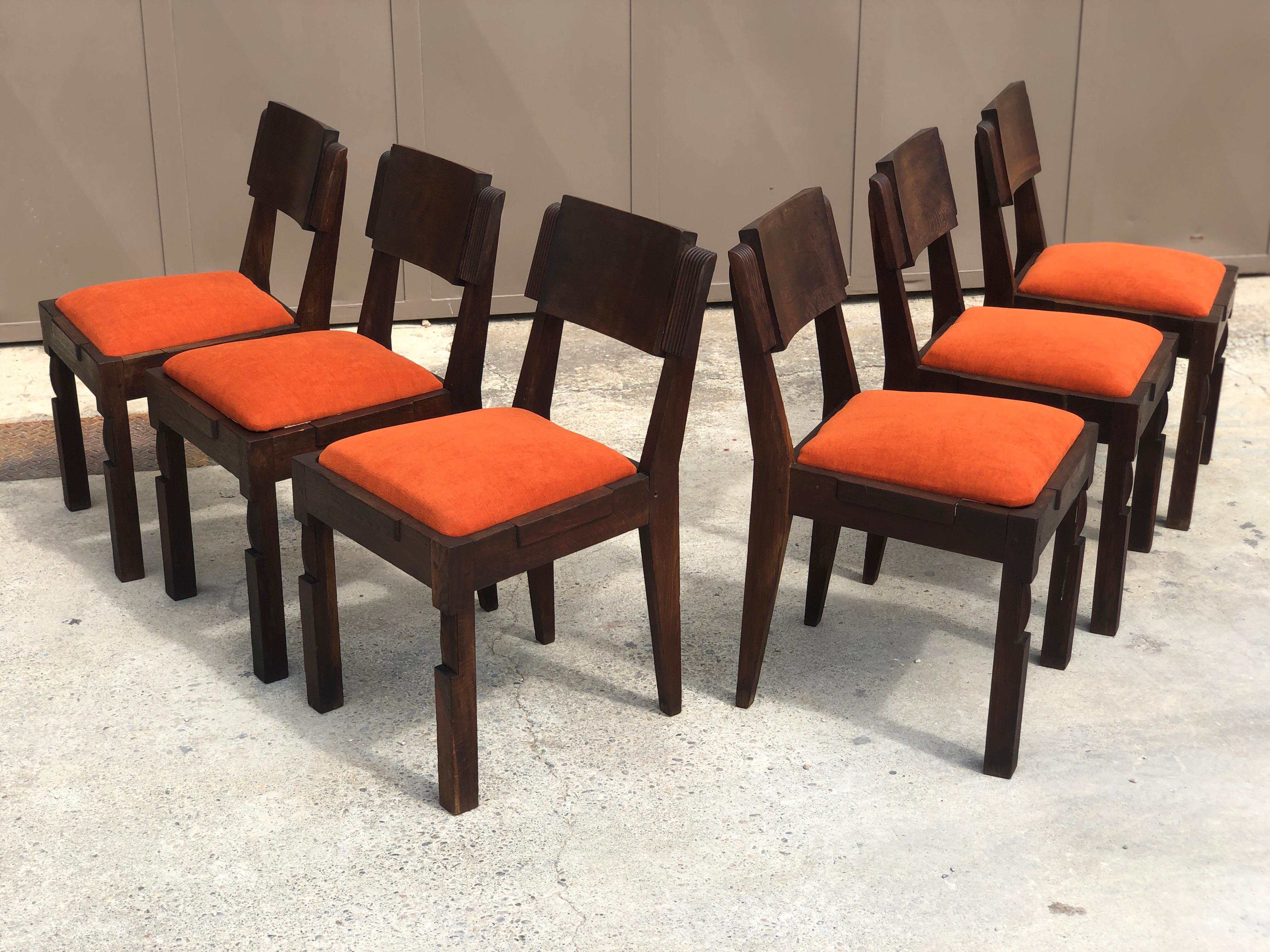 Set of 6 Charles Dudouyt chairs signed 1940 in carved oak. The legs of the chairs are carved in diamond point, the seats are removable, restored in Casal Aquaclean fabric (washable) terracotta color. The signature is on the interior crossbars.