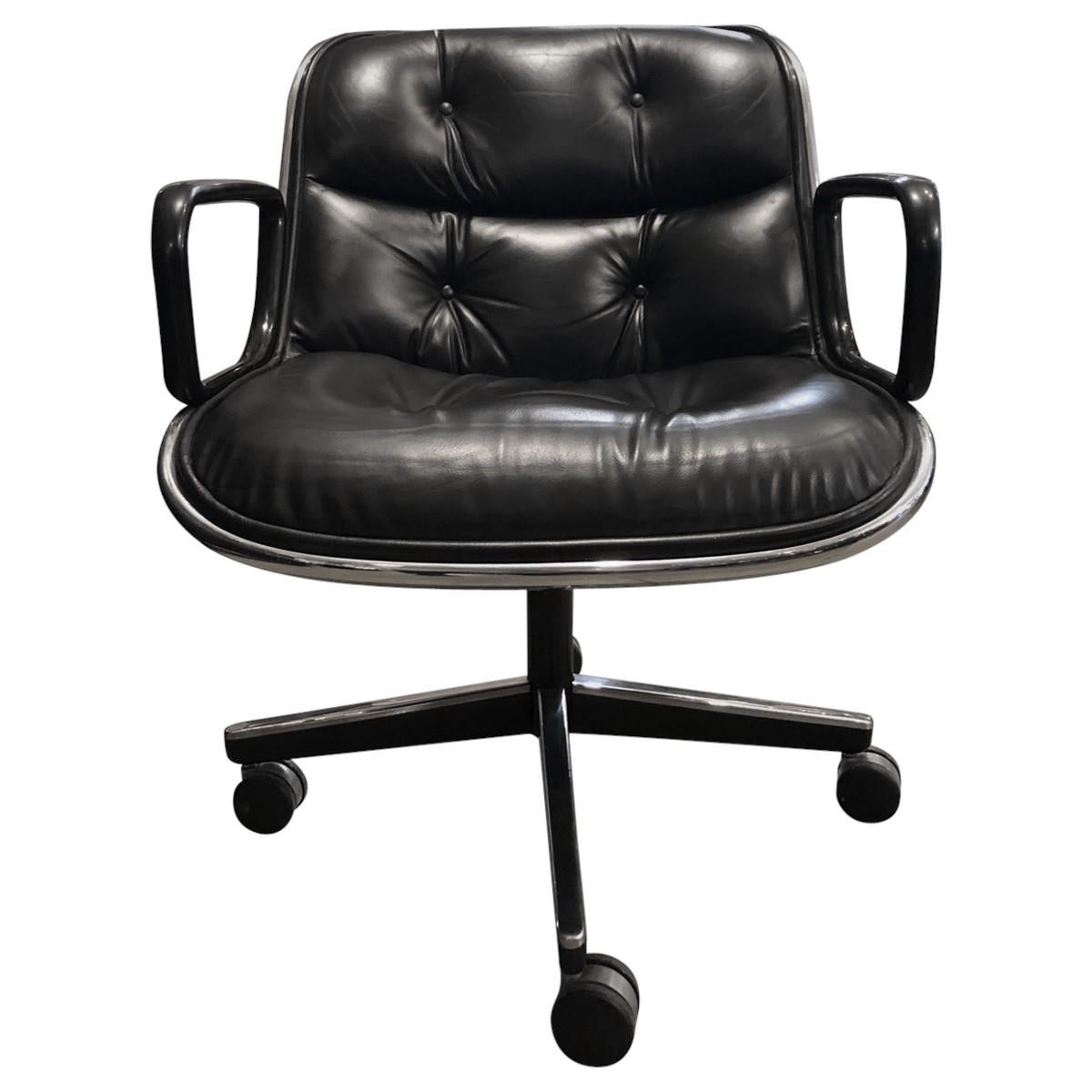 Charles Pollock was an industrial designer who created sleek furniture, most notably an office chair held together by a single aluminum band that became known as a Pollock Chair. These Pollock executive chairs combine elegant chic and plush comfort