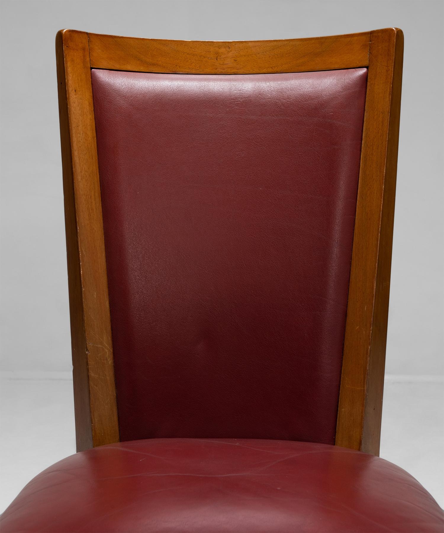 With original vinyl upholstery and brass studs.


Measures: 17.5” W x 18” D x 37” H x 19” seat.


  
