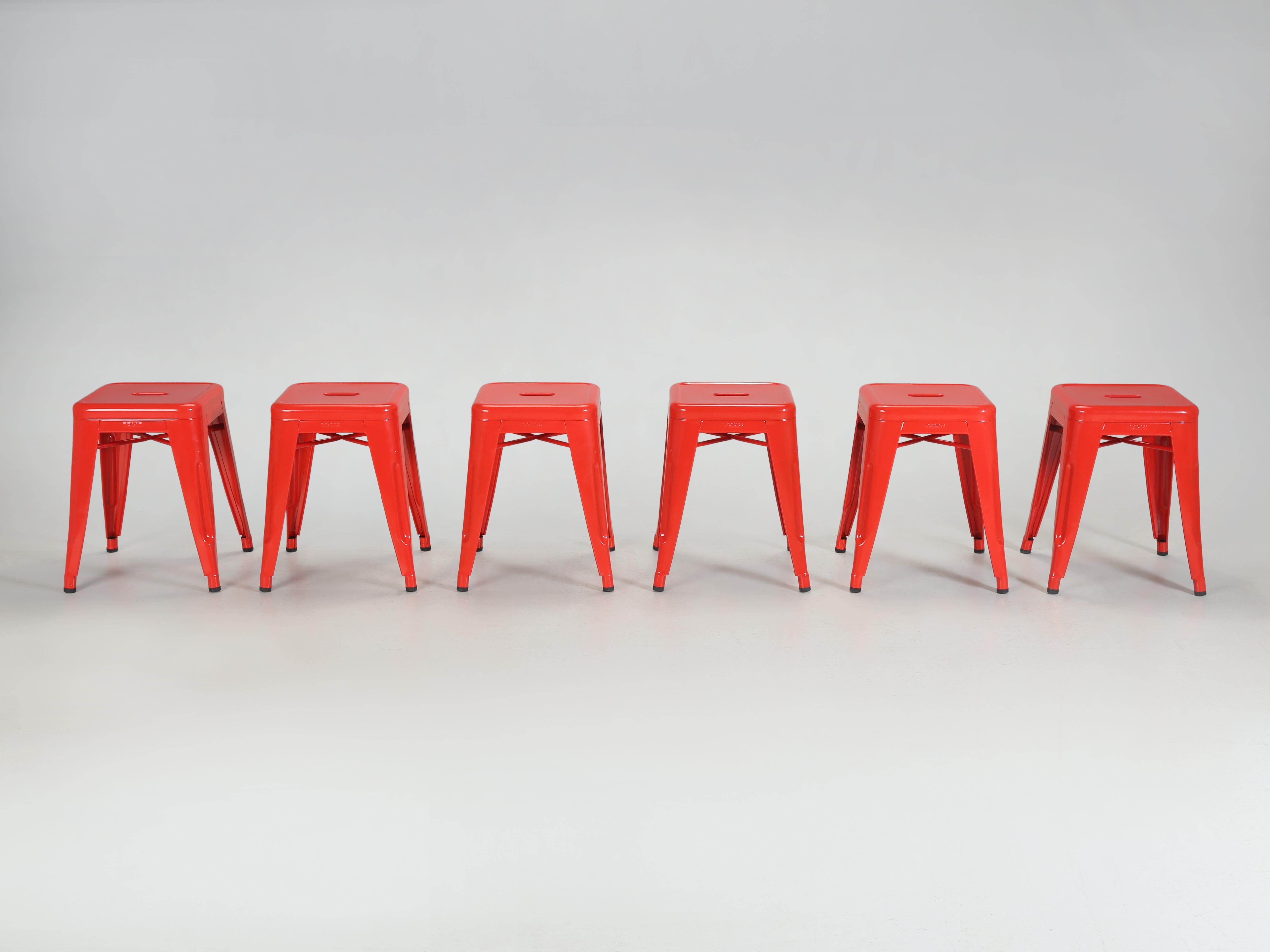 Set of (6) Tolix Steel Stacking Stools in Chile Pepper Red. The stools are a shade under 18