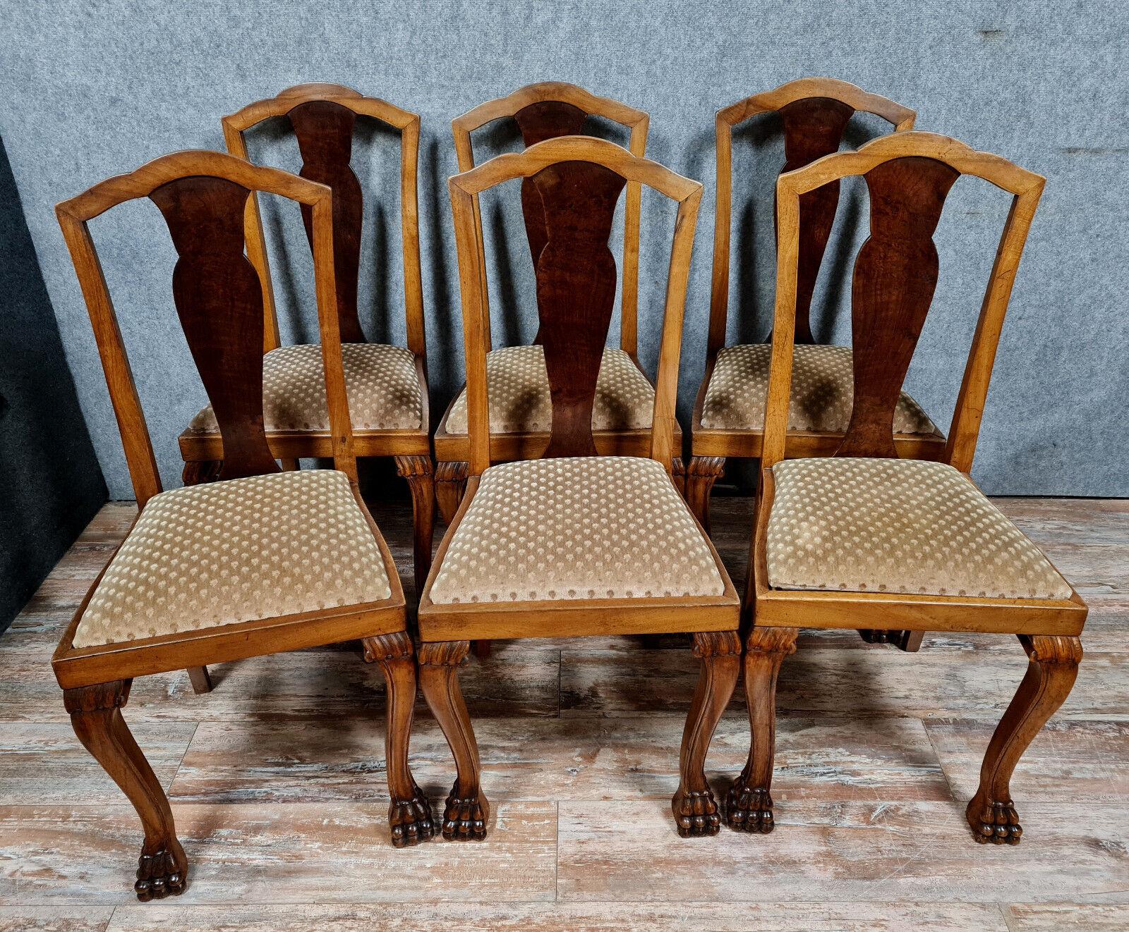 Enhance your dining experience with this exquisite set of 6 Chippendale chairs, crafted in alternating light and dark mahogany tones around 1880-1900. Each chair features plush velvet-style Genoese fabric seats, intricately pierced backs, and