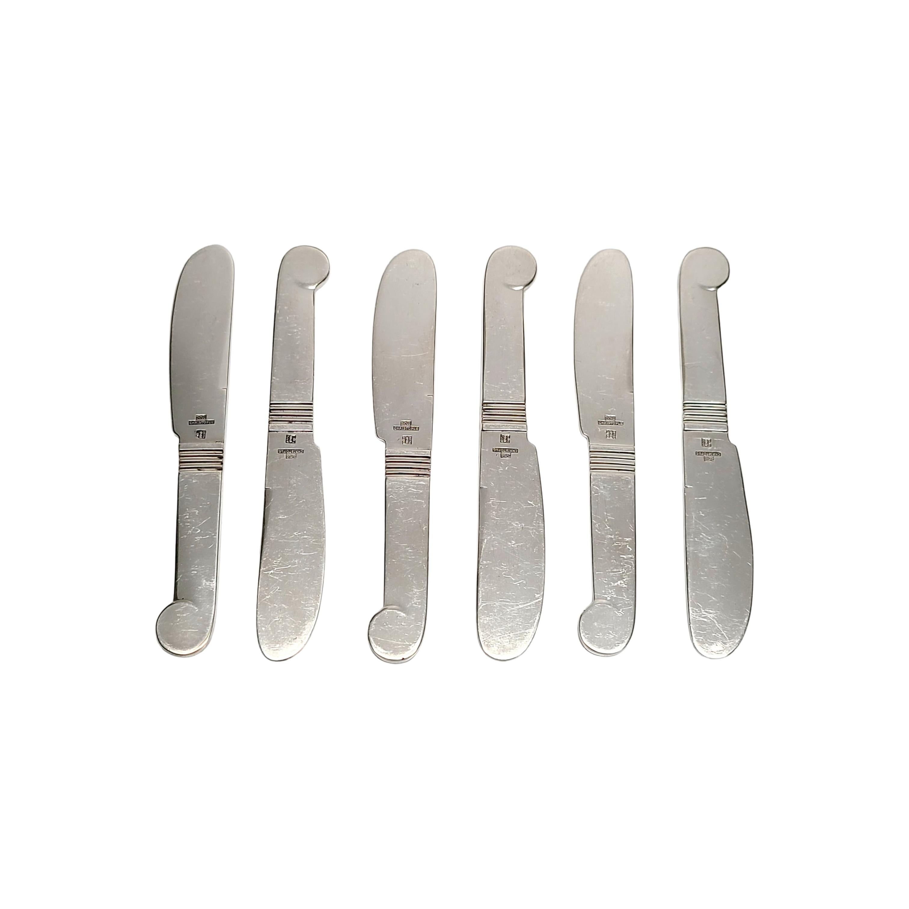 Set of 6 vintage silver plate Pate/Caviar/Butter Knives in Luc Lanel pattern by Christofle.

The Luc Lanel pattern is a simple and elegant design featuring a swirl design at the end of each handle.

Measures 3 7/8