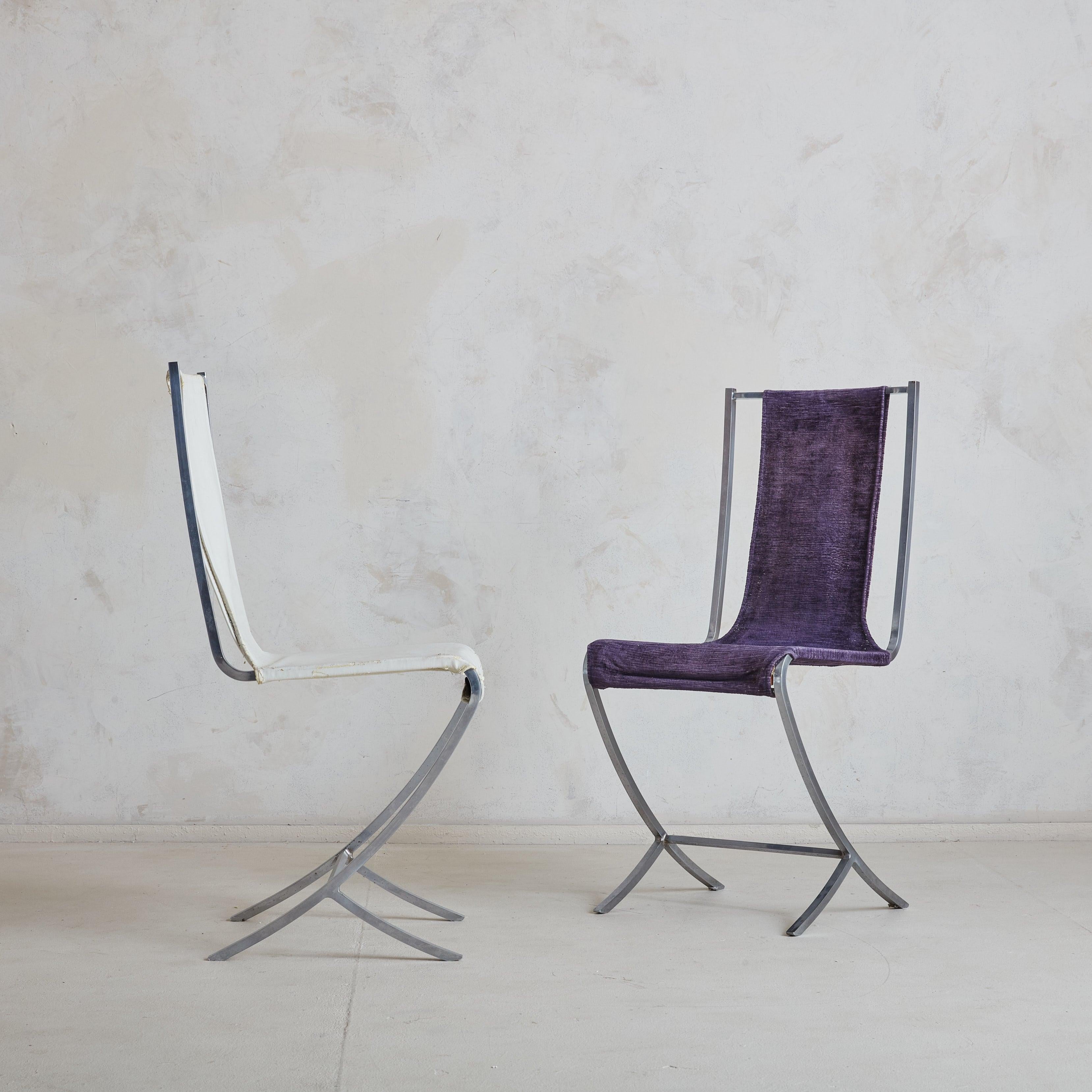 A striking set of six dining chairs from the 1970s, attributed to Pierre Cardin for Maison Jansen. These Minimalist chairs feature chrome-plated metal frames with high backs and subtly curved legs. This set includes four chairs upholstered in smooth