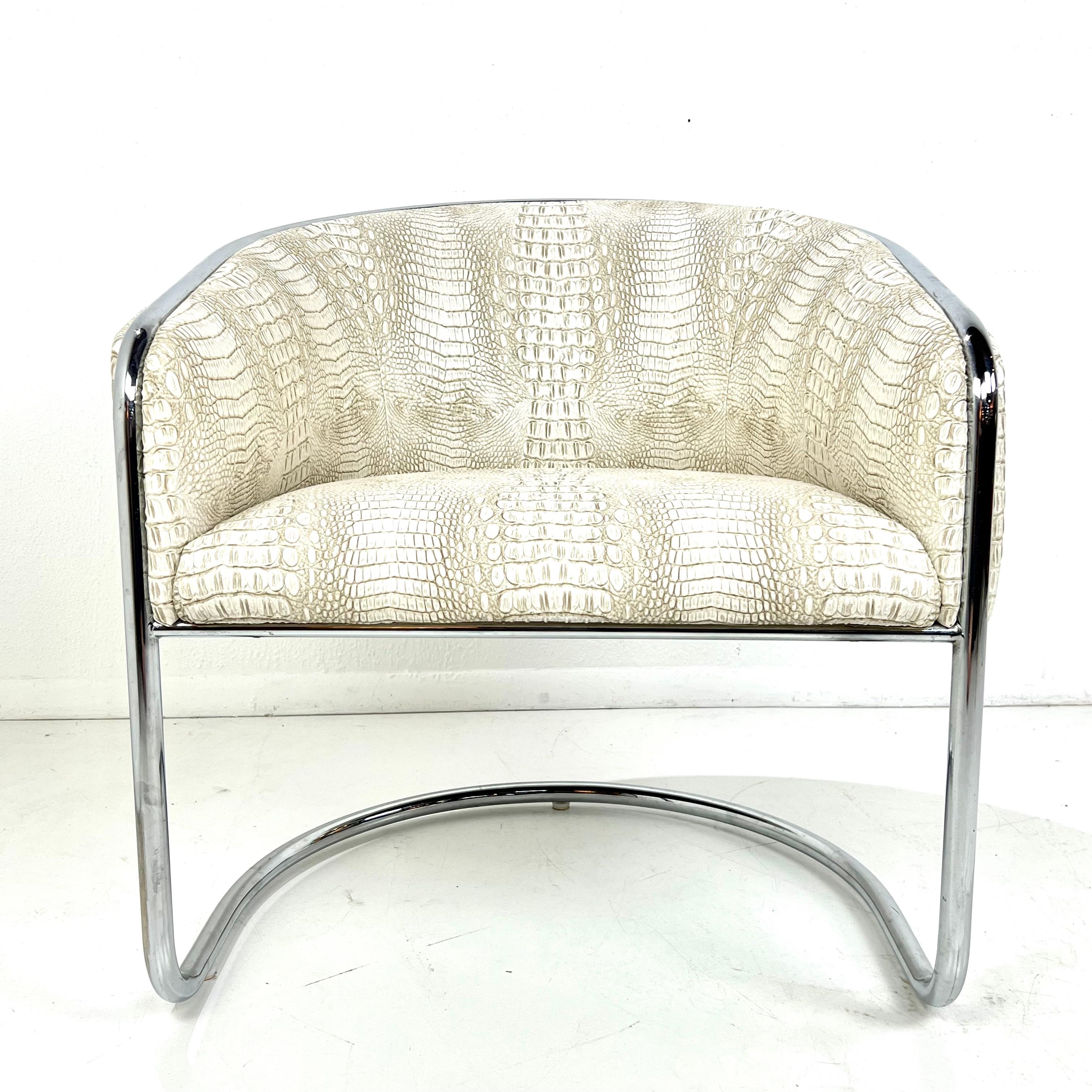 Showstopping set of 6 chrome cantilever “club tub” chairs recently reupholstered in gorgeous faux white crocodile. Designed by Anton Lorenz & Joan Burgasser for Thonet, circa 1980s. 
Very good vintage condition, upholstery like new. Chrome frame is