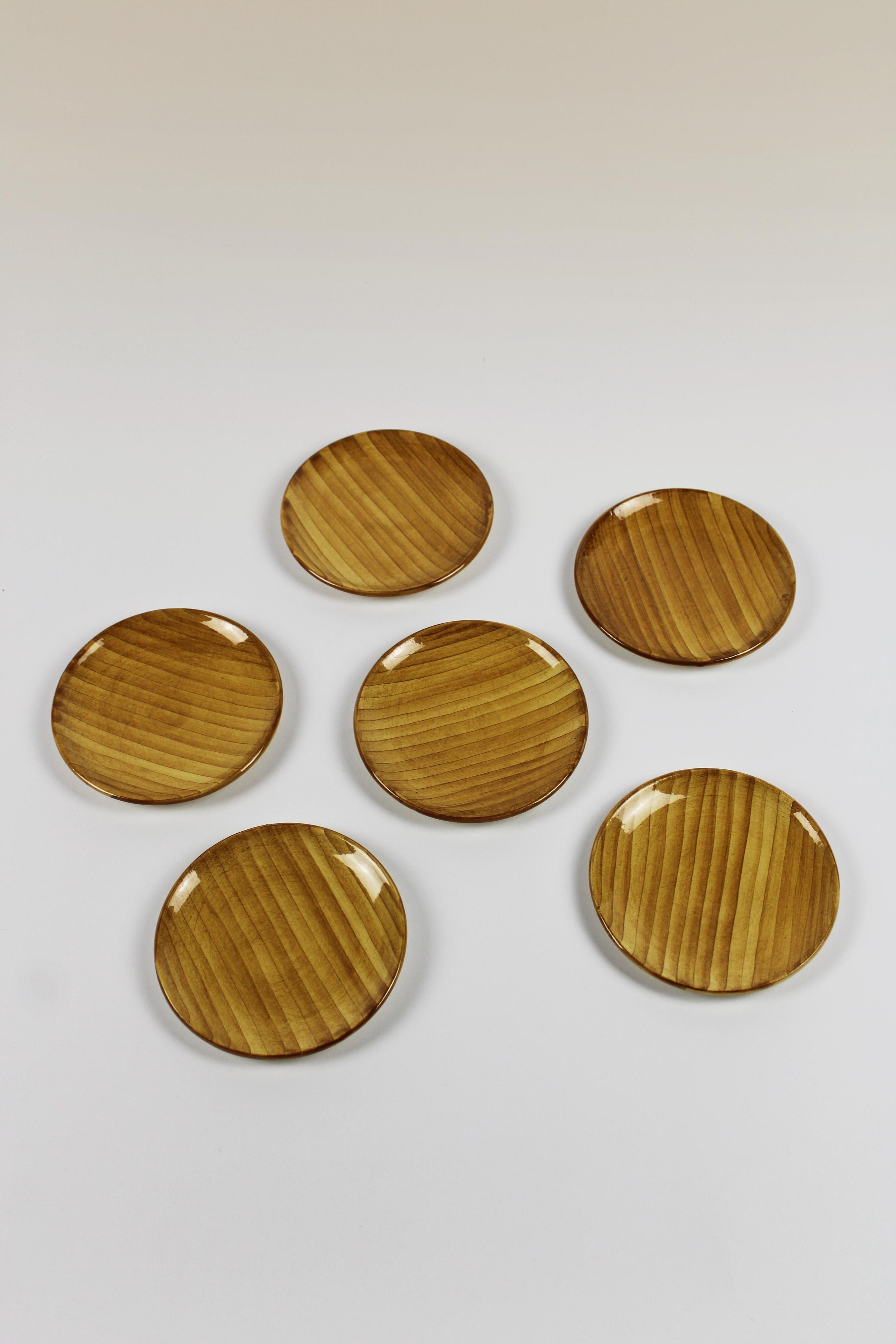 Experience the vintage elegance of mid-century France with this exquisite set of 6 coasters from Vallauris Grandjean Jourdan, originating from the 1960s. Crafted with care and attention to detail in France, these ceramic coasters feature earthy