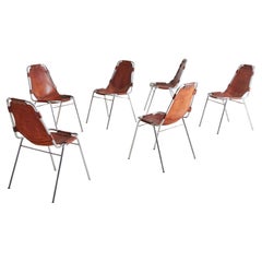 Conjunto de 6 sillas Les Arcs de cuero coñac atribuidas a Charlotte Perriand