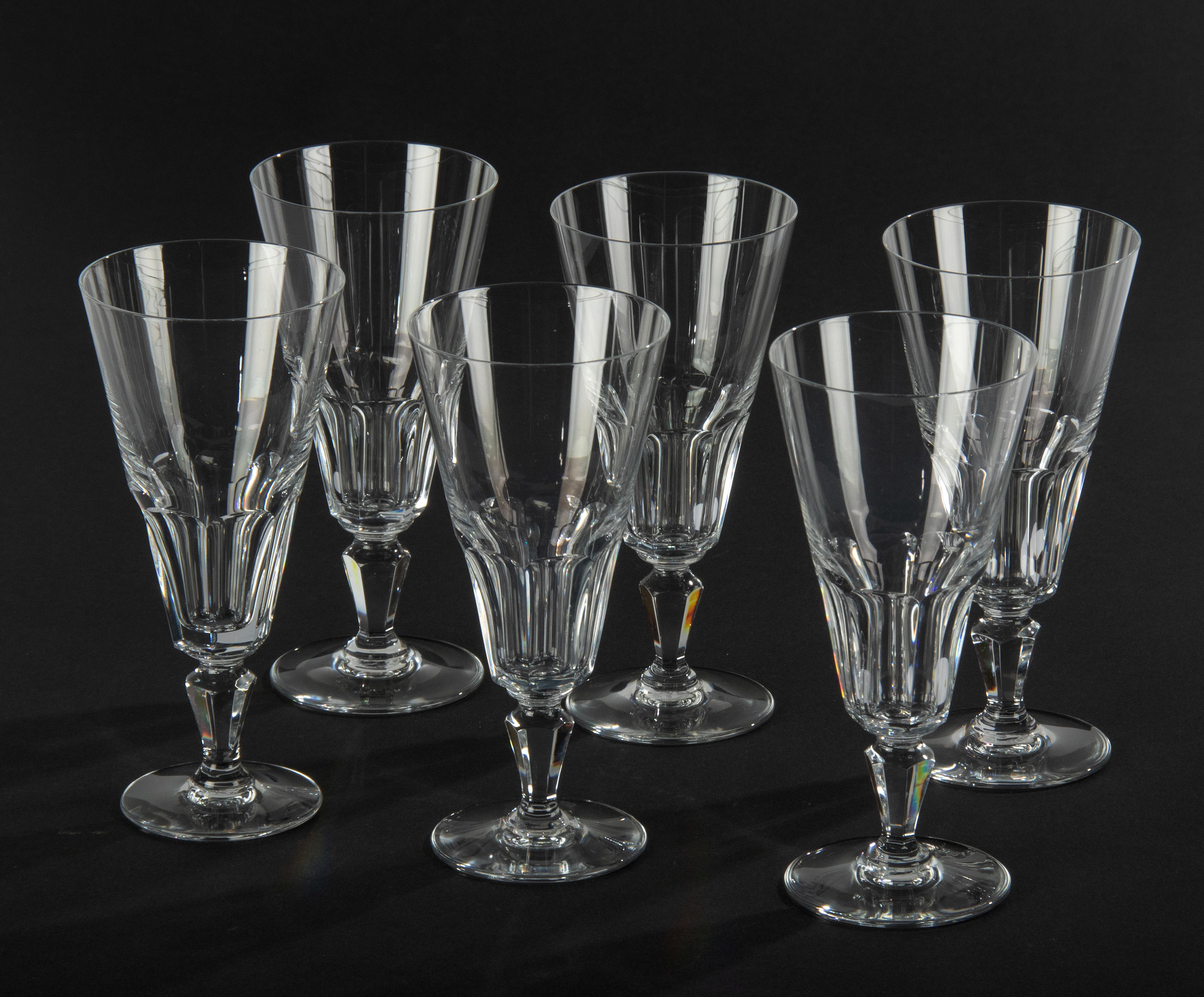Nice set of 6 crystal champagne glasses, made by the French brand Baccarat. It is a classic model, timeless design. Produced around 1960-1970. In very good condition. All glasses are marked on the bottom.