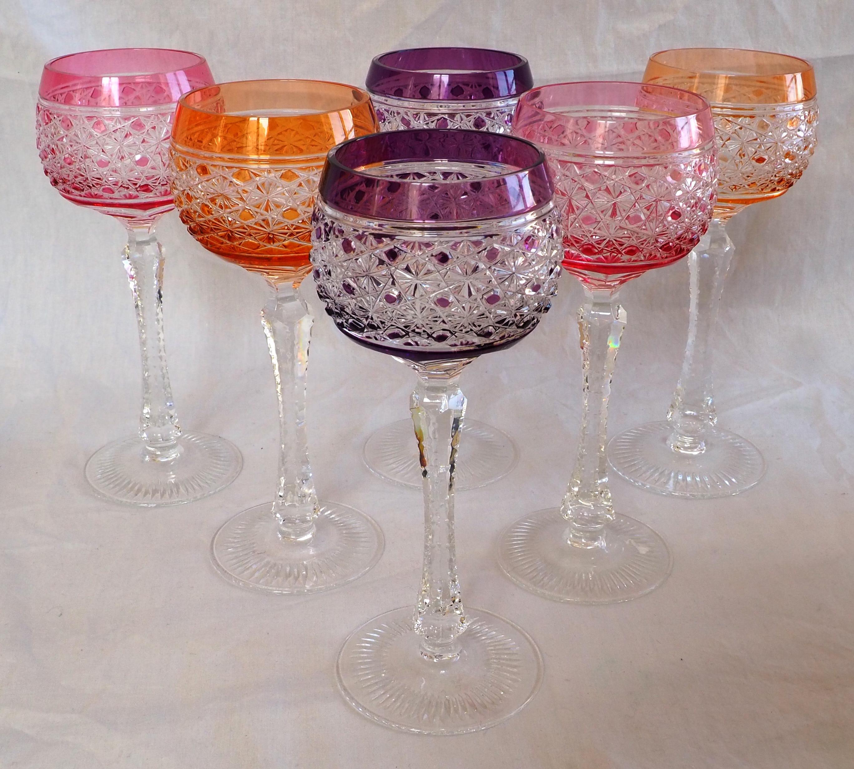 Set of 6 tall colored wine glasses in the spirit of French crystal maker Baccarat (so-called roemers / hock glasses, initially designed to savor wines from the valley of the Rhine area).
Overlay crystal (meaning that the initial clear crystal is