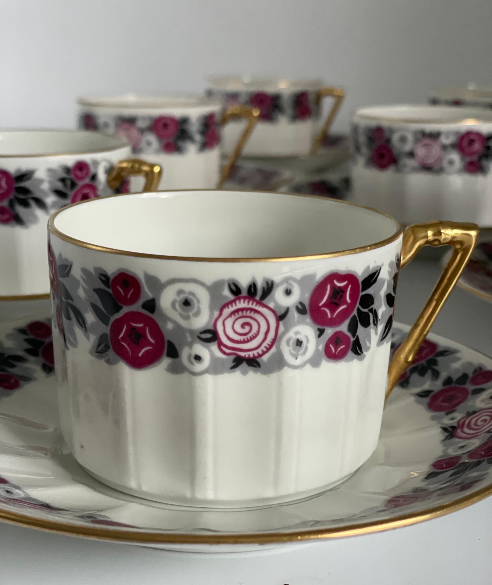 French Limoges porcelain tea or coffee service by Chabrol et Poirier, 1925 

These 6 cups are signed by the Manufacture of Limoges Chabrol et Poirier and bear the fabulous mention Grand Prix Exposition Internationale des Arts décoratifs Paris