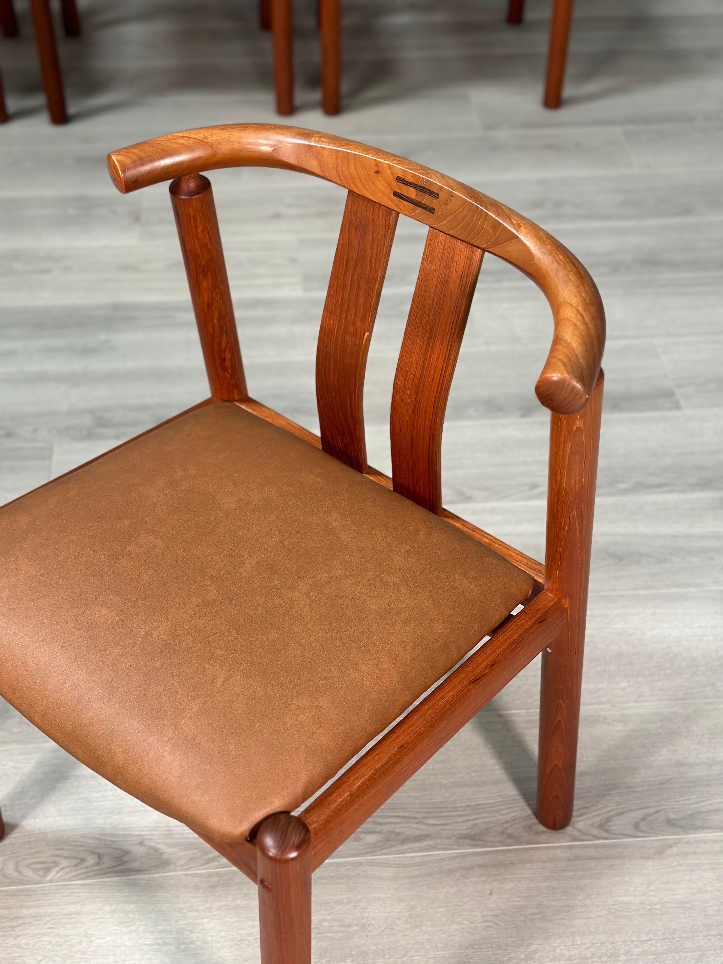 A set of 6 Danish dining chairs by Hans J. Frydendal for Boltinge Stolefabrik dating to the 1970’s. The chairs are made from a solid teak frame with freshly upholstered vinyl seat pads in very good condition with some slight age related wear to the