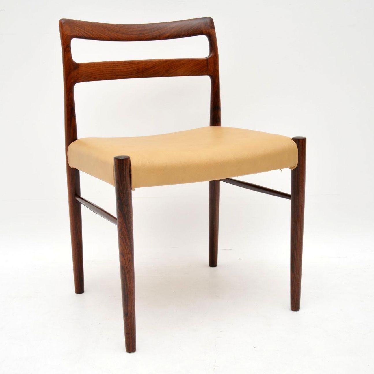 A stunning and extremely rare set of Danish solid wood dining chairs with leather seats, these were made by Soren Willasden in the 1960s. They are in superb condition throughout, the frames are nicely polished, sturdy and sound with a gorgeous color