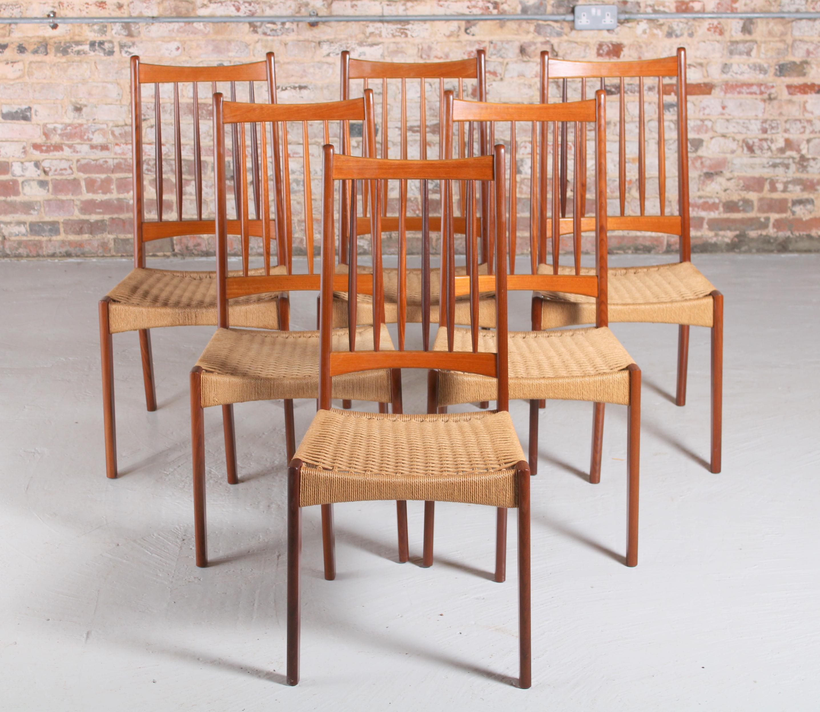 Set of 6 Danish dining chairs with weaved papercord seats by Arne Hovmand-Olsen for Mogens Kold, 1960s. Very good condition. Some minor light coloured stains on the papercord seats.