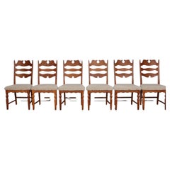 Set of 6 Danish Henning Kjærnulf Chairs of Solid Oak with New Sheepskin, 1970s