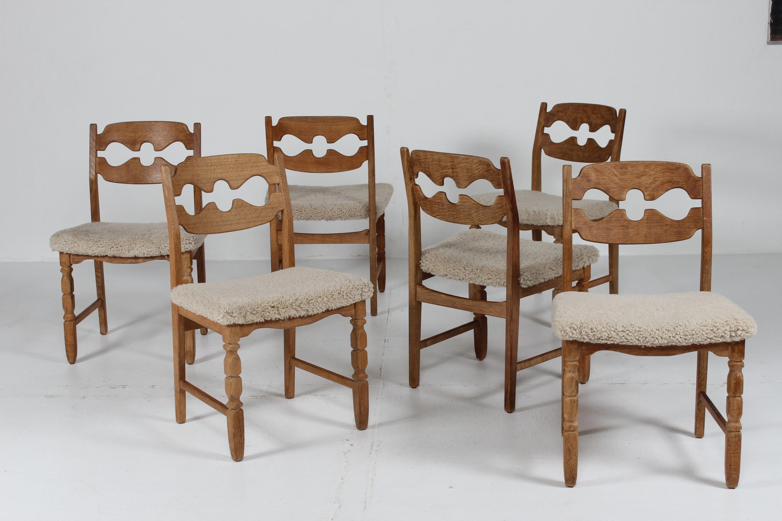 Here is a set of 6 Danish vintage razor blade chairs in great country style. 
They are designed by Henning Kjærnulf and manufactured by the Danish company Nyrup Møbelfabrik/ EG Furniture.
The chairs are made of solid oak with upholstery of new