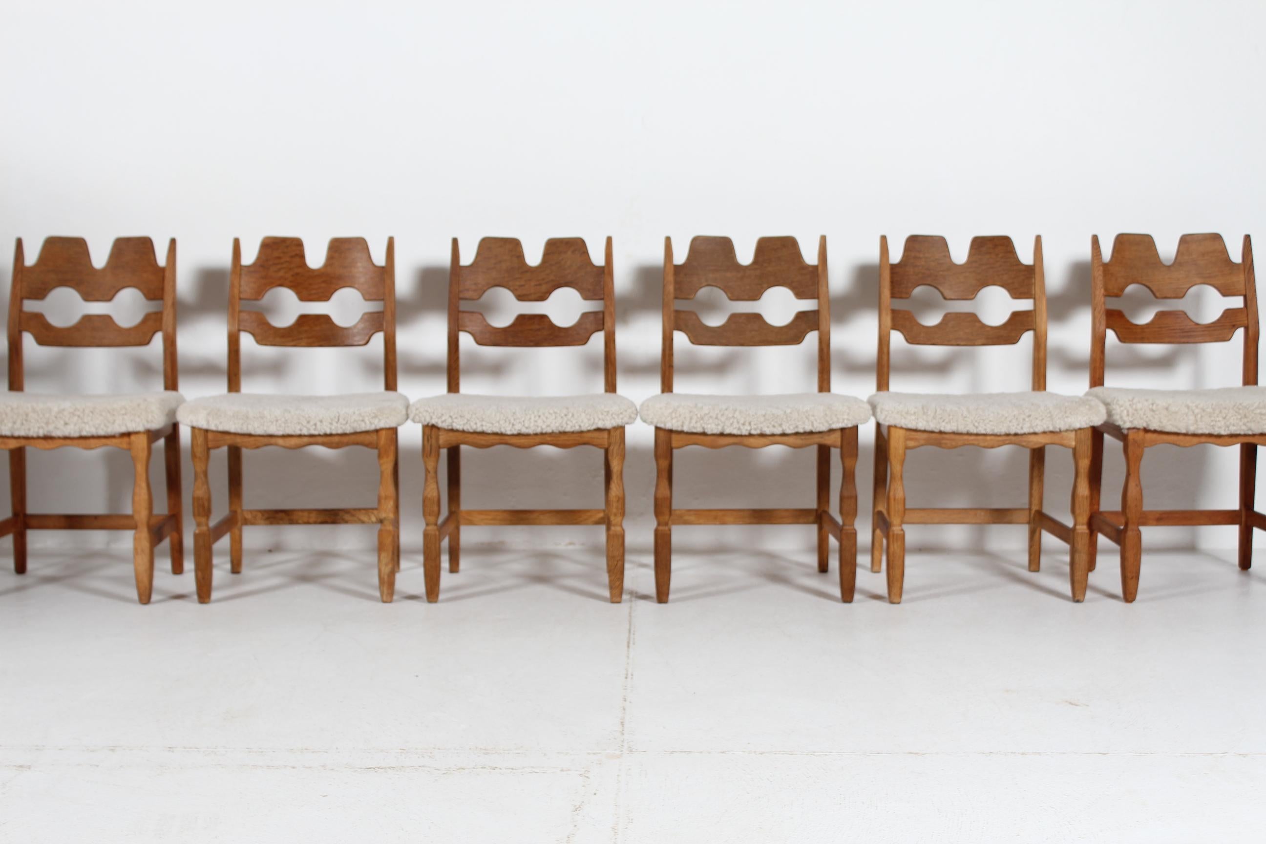 Here is a set of 6 Danish vintage razor blade chairs in great country style. 
They are designed by Henning Kjærnulf and manufactured by the Danish company Nyrup Møbelfabrik/ EG Furniture.
The chairs are made of solid oak with great warm colour and