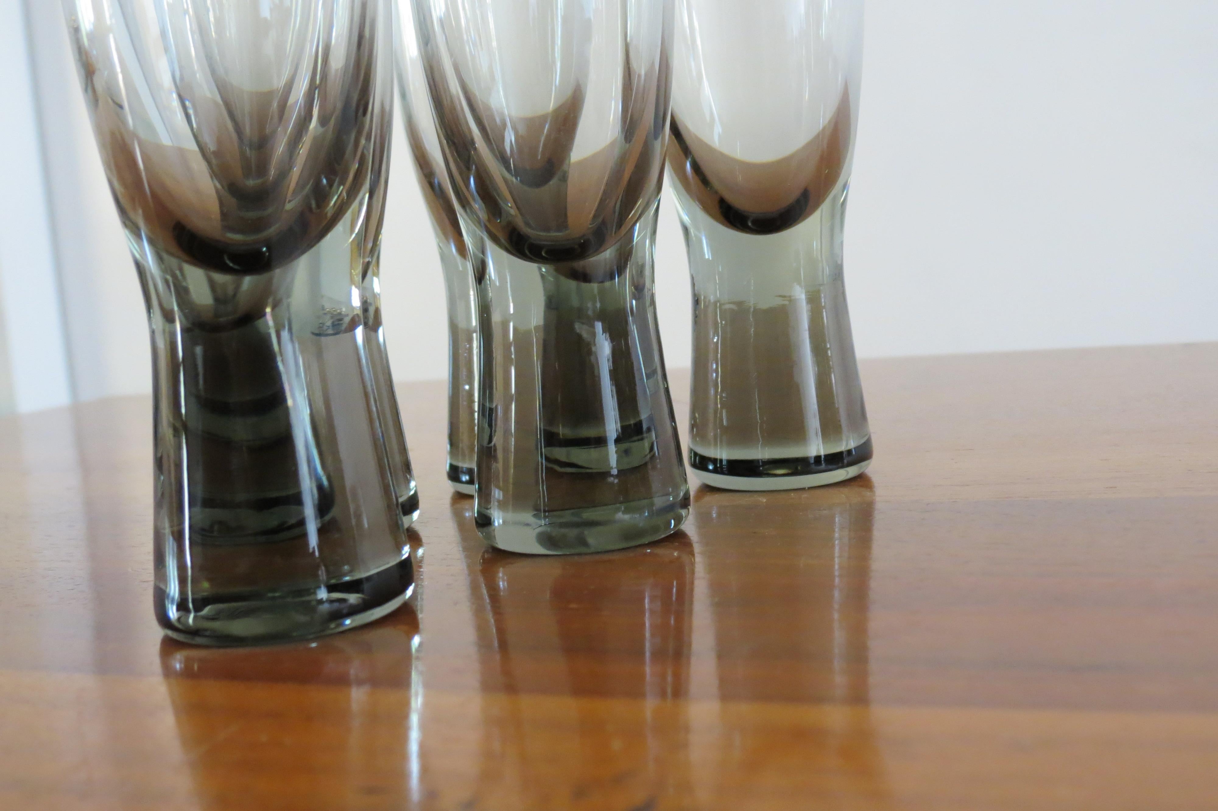 A set of six vintage Holmegaard glasses.
Designed by Per Lutken, model Canada, 1950s.
Two sets of six available.
Smoked glass
Good condition.
Measures: 11.5 cm tall, 4.2 cm diameter widest point
St926.

 