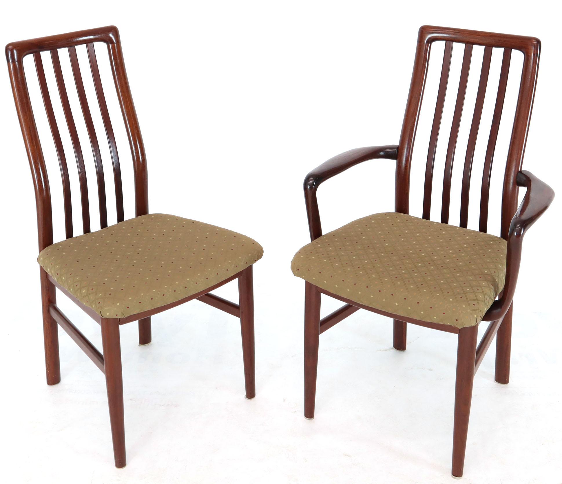 Set of six Danish Mid-Century Modern rosewood dining chairs. High quality rock solid rosewood frames. The armchairs measure 22