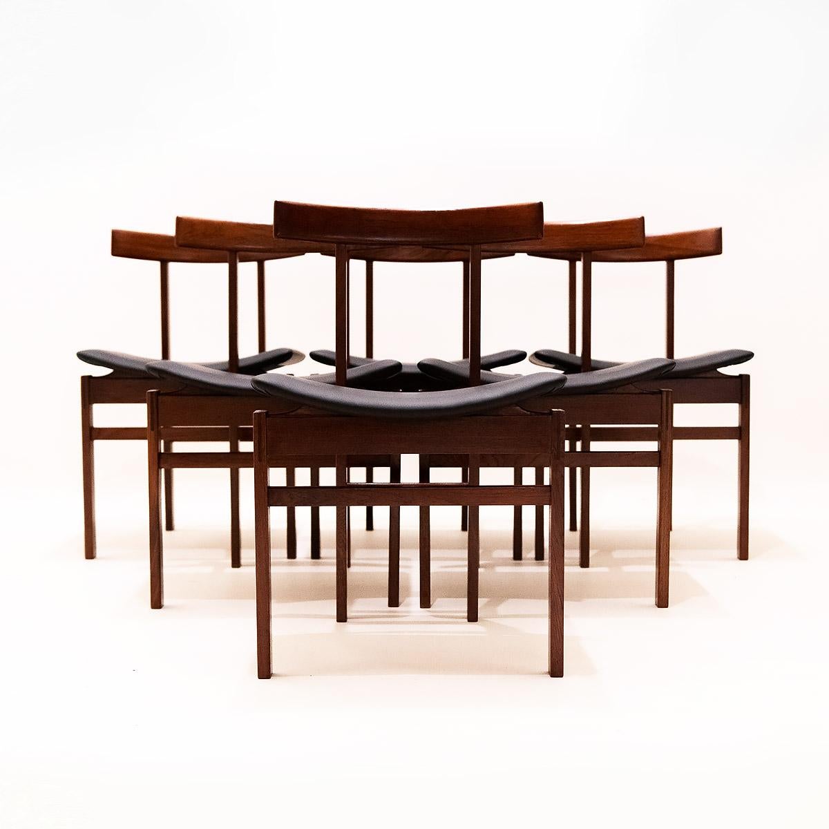 A set of 6 Model FD193 Danish Mid-Century Modern teak and black leather dining chairs designed by Inger Klingenberg for France & Søn. 

Danish designer Inger Klingenberg (1932-1997) produced some of the most compelling furniture designs of the