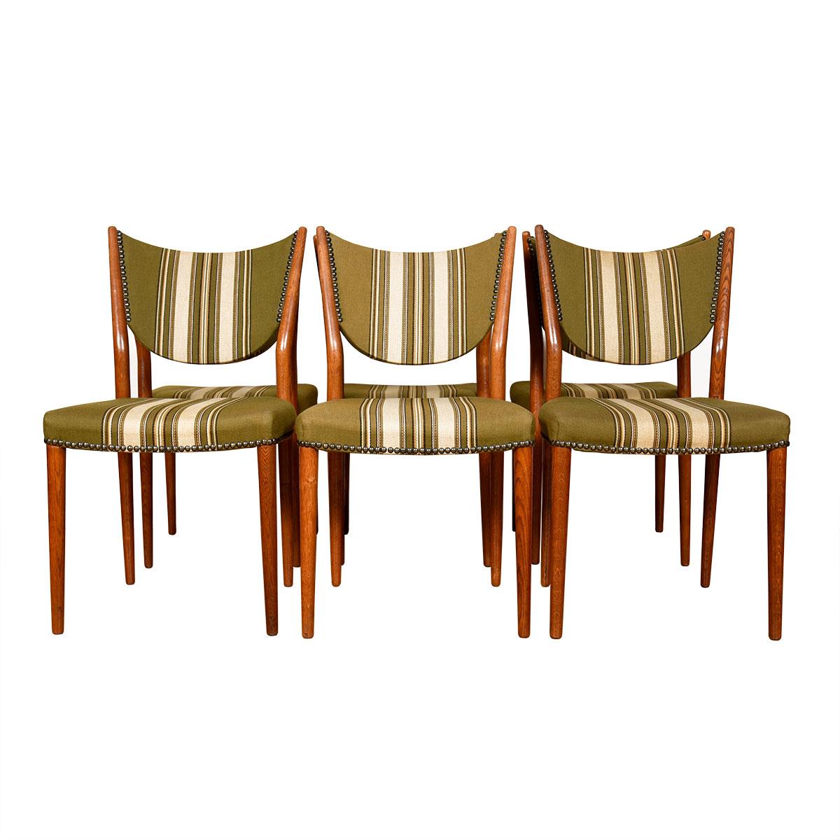 Set of 6 Danish Modern Dining Chairs with Striped Upholstery

Additional information:
Material: Upholstery
Featured at Kensington: 
The traditional shield-shape back goes modern on these beautiful Danish modern chairs.
Fully upholstered seat