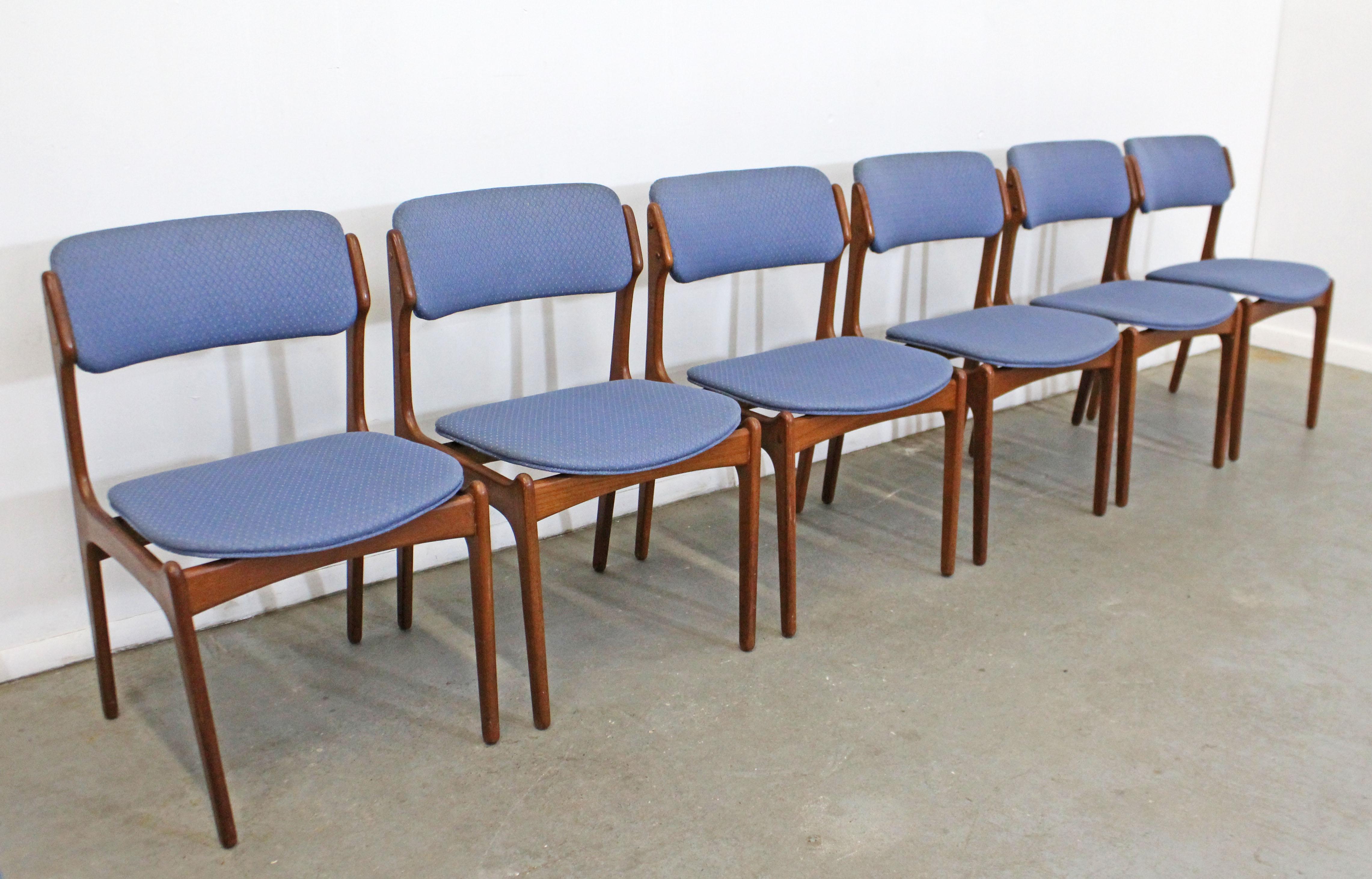 Offered is a vintage set of 6 Danish modern dining chairs, designed by Erik Buch for O.D. Mobler. These chairs have elegant lines and 'floating' seats with teak bases and upholstered seats/backs. They are in good vintage condition with some age wear