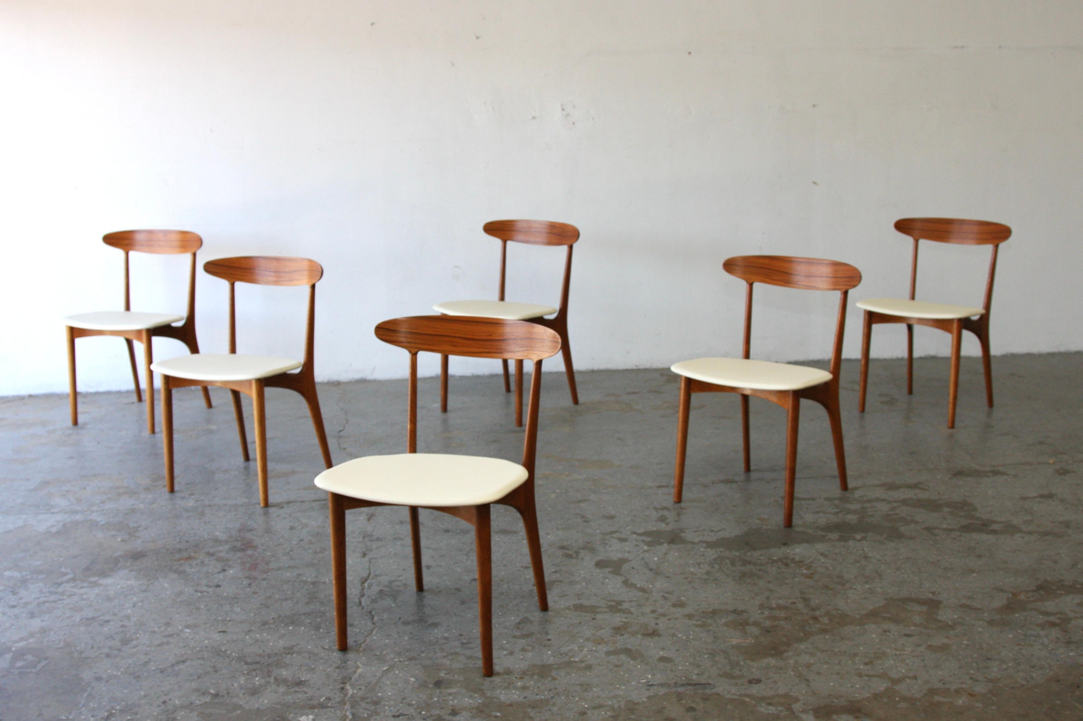 Set of 6  Danish Modern Kurt Østervig Teak Dining Chairs 

Exquisite and Rare 1955 Dining Chairs by Kurt Østervig for Brande Møbelindustri
Discover a remarkable piece of design history with this set of 6 dining chairs, exquisitely Designed in 1955