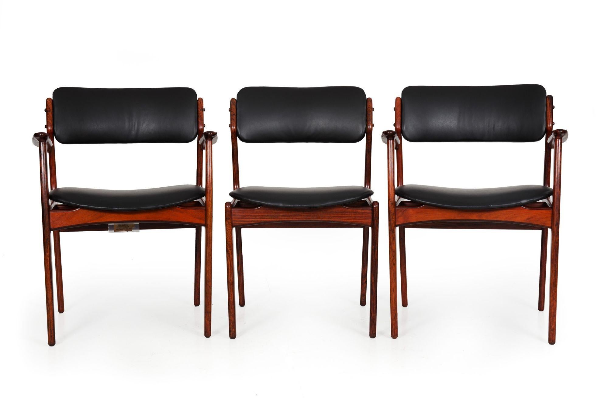A very fine set of the model OD-49 and OD-50 by Erik Buch for O.D. Møbler, they are executed in the relatively rare and always incredibly beautiful rosewood surfaces. All chairs have been expertly refinished while maintaining the underlying patina