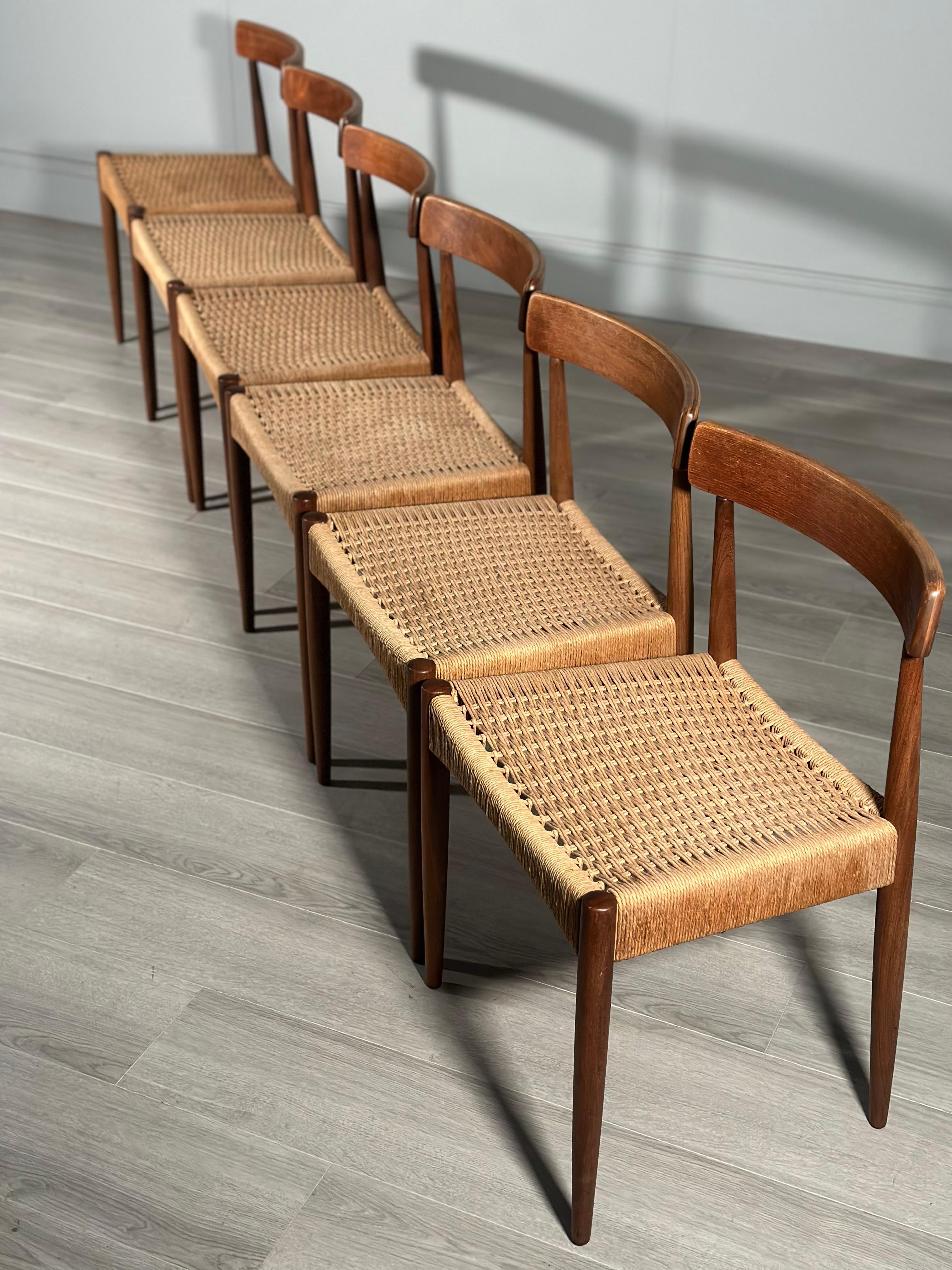 Mid-20th Century Set of 6 Danish Teak And Paper Cord Dining Chairs Designed By Arne Hovmand Olsen For Sale