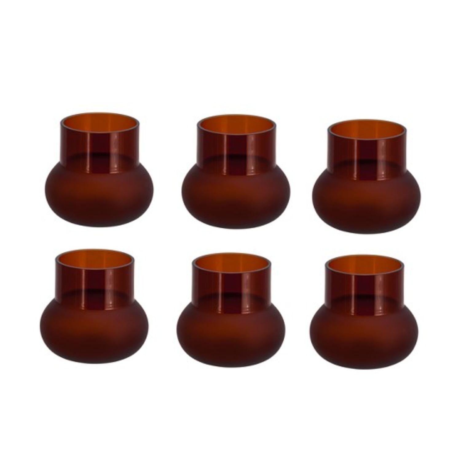 Set of 6 dark amber glasses by Pulpo
Dimensions: D10 x H9 cm
Materials: handmade glass

Pick them, pour them, roll them, and hold them; a kaleidoscope of colour, form and texture awaits. The potpourri collections by German designer Meike Harde