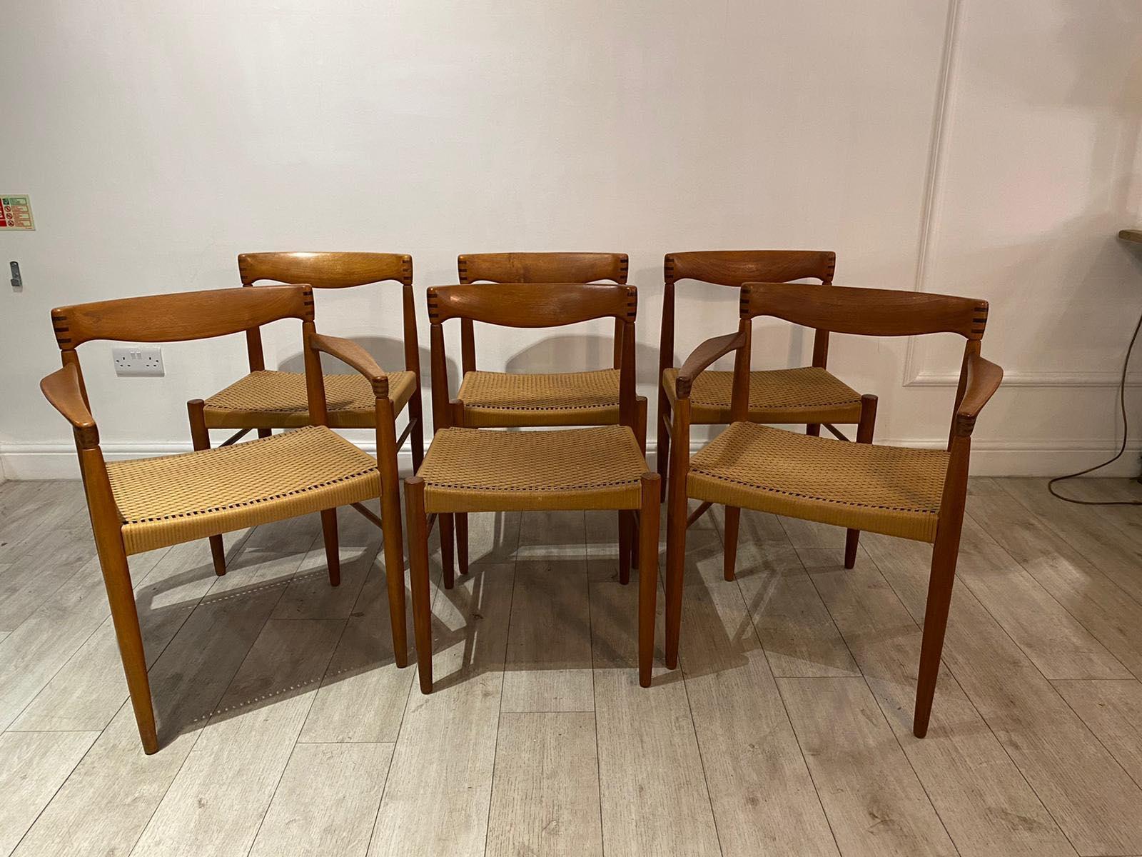 A beautiful set of 6 dining chairs and extendable dining table in teak wood designed by H.W. Klein and manufactured by Bramin furniture factory in the 1960s and have the Bramin label underneath the table top.

The chairs have beautiful and rare
