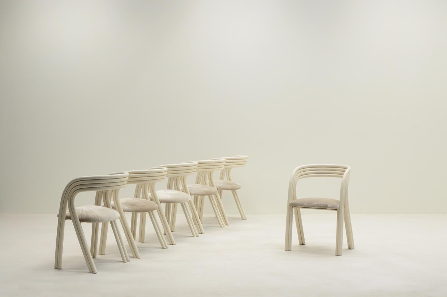 Set of 6 dining chairs by  Axel Enthoven for Rohé Noordwolde, 1970s The Netherlands. Elegant white steam bent frame and reupholstered seat in a champagne colored Mohair fabric. A steel frame fitted to the underside of the seat and has been skilfully